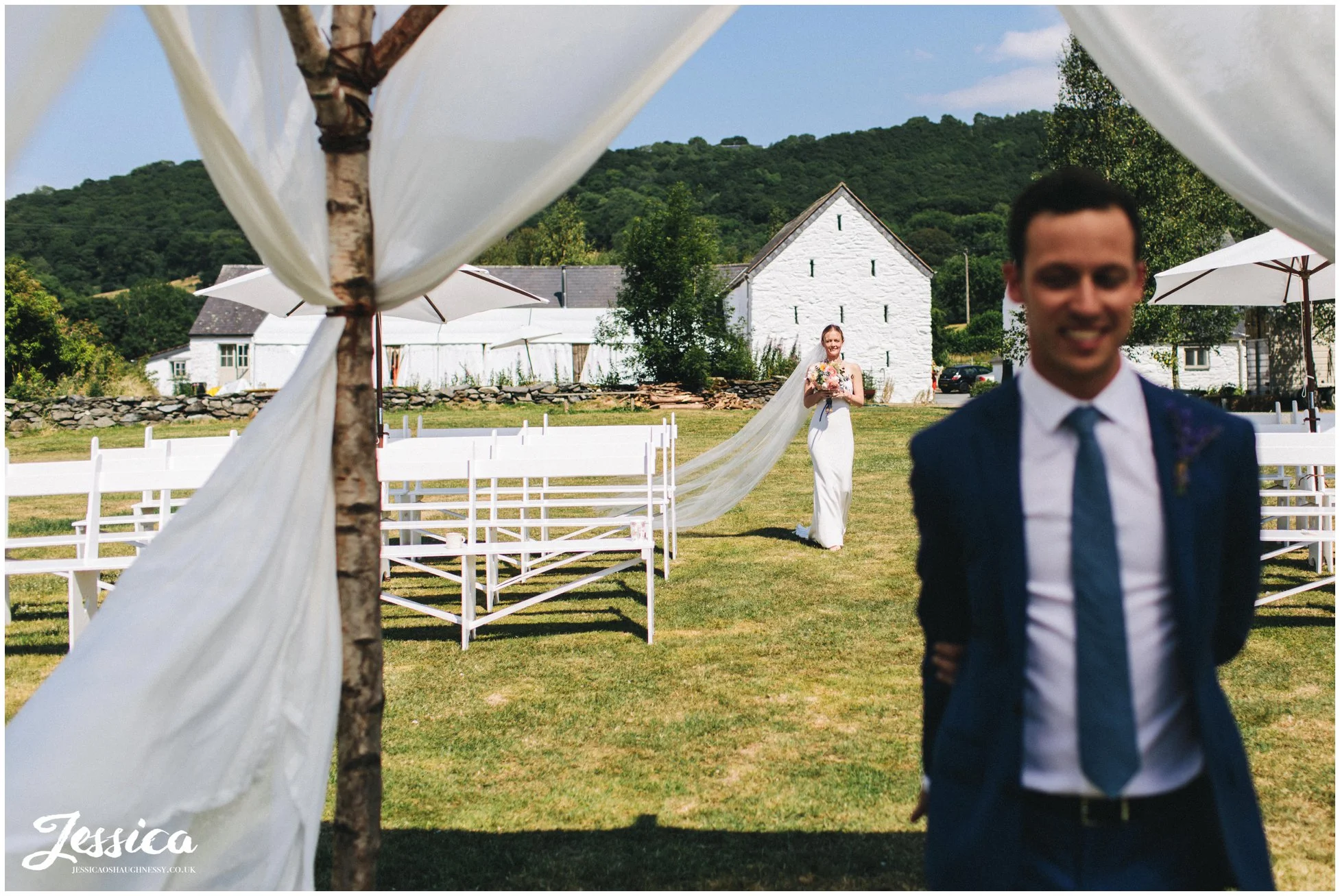the bride walks to the groom for their first look