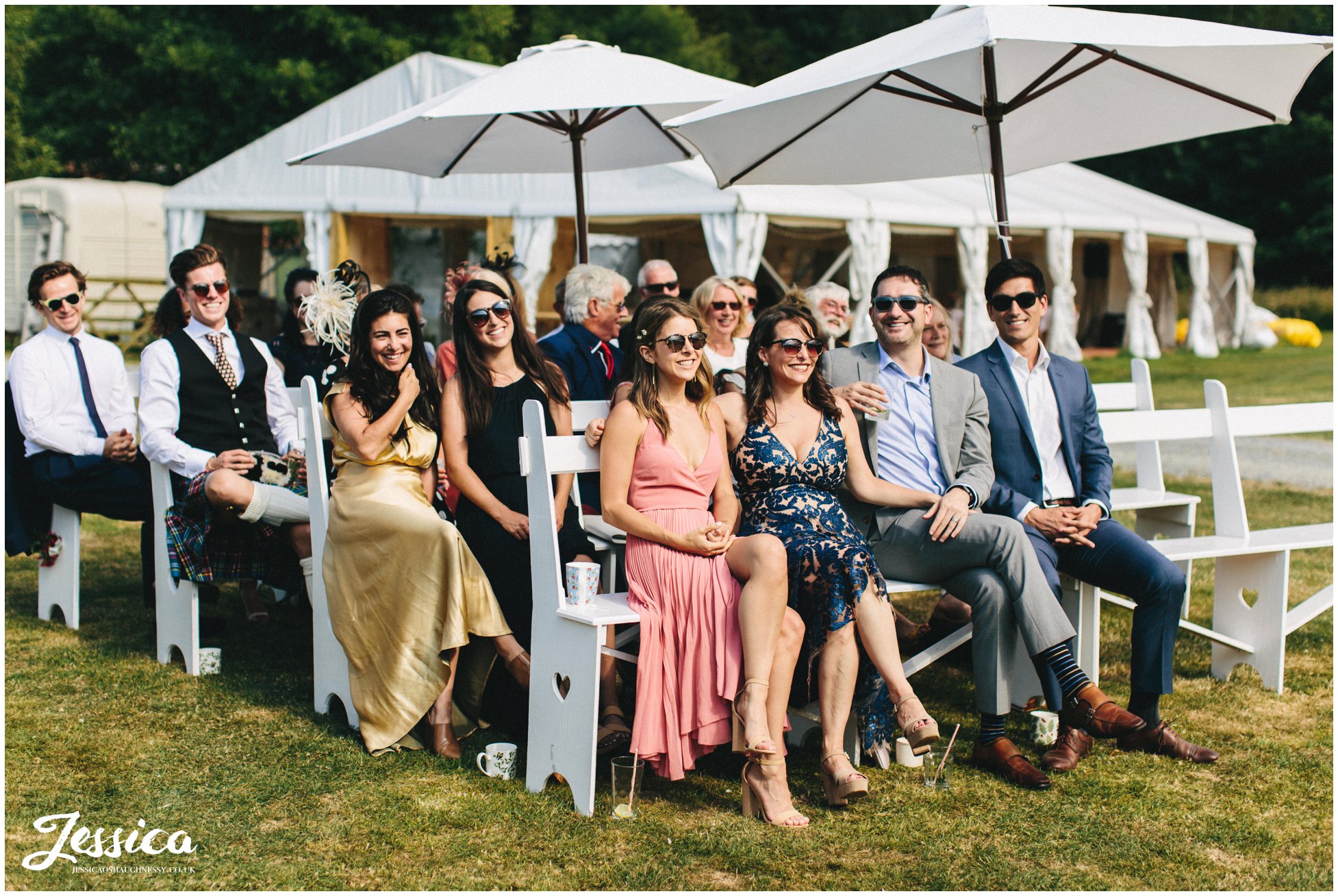 guests smile during the outdoor ceremony at hafod farm