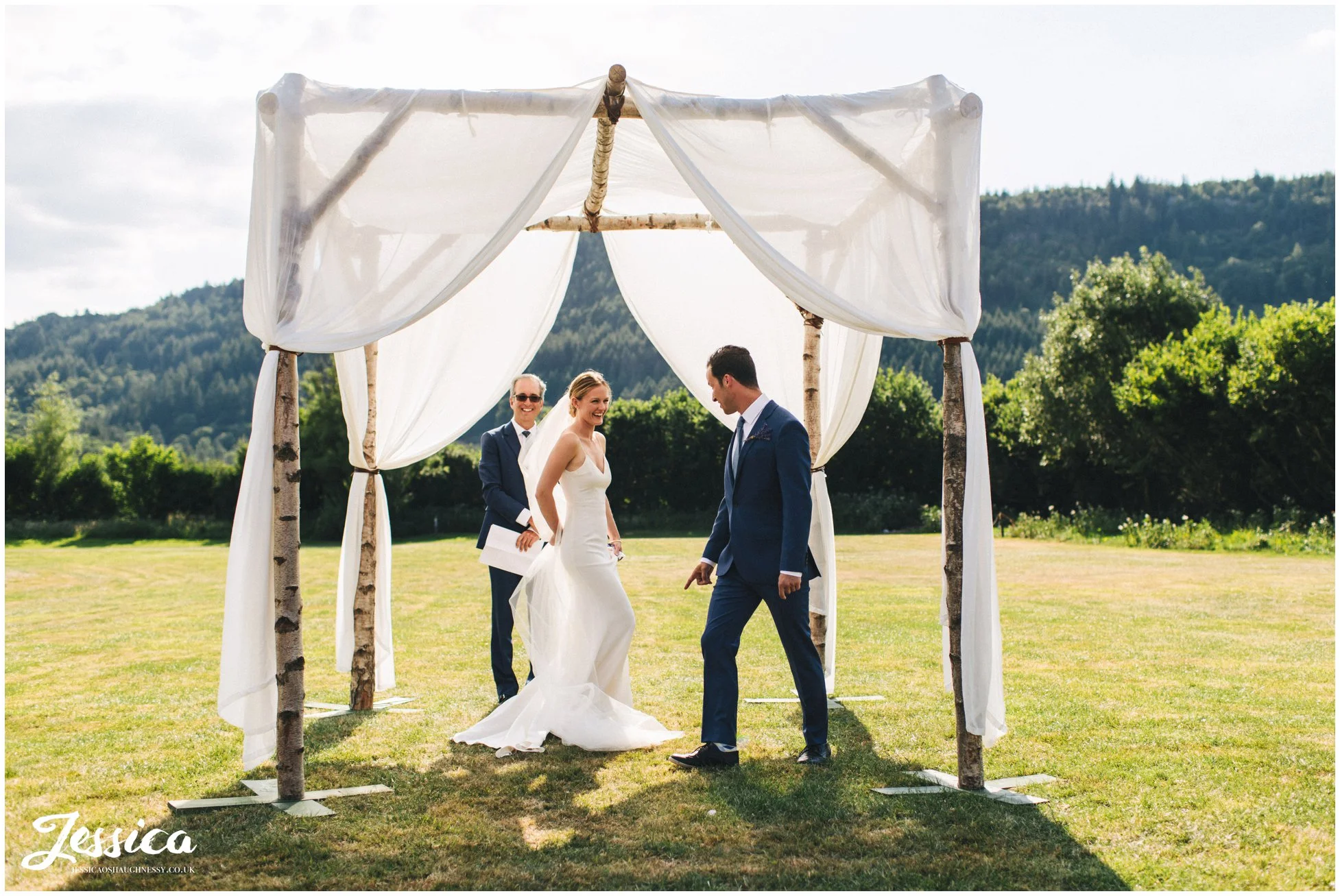 the bride & groom carry out jewish traditions by circling each other