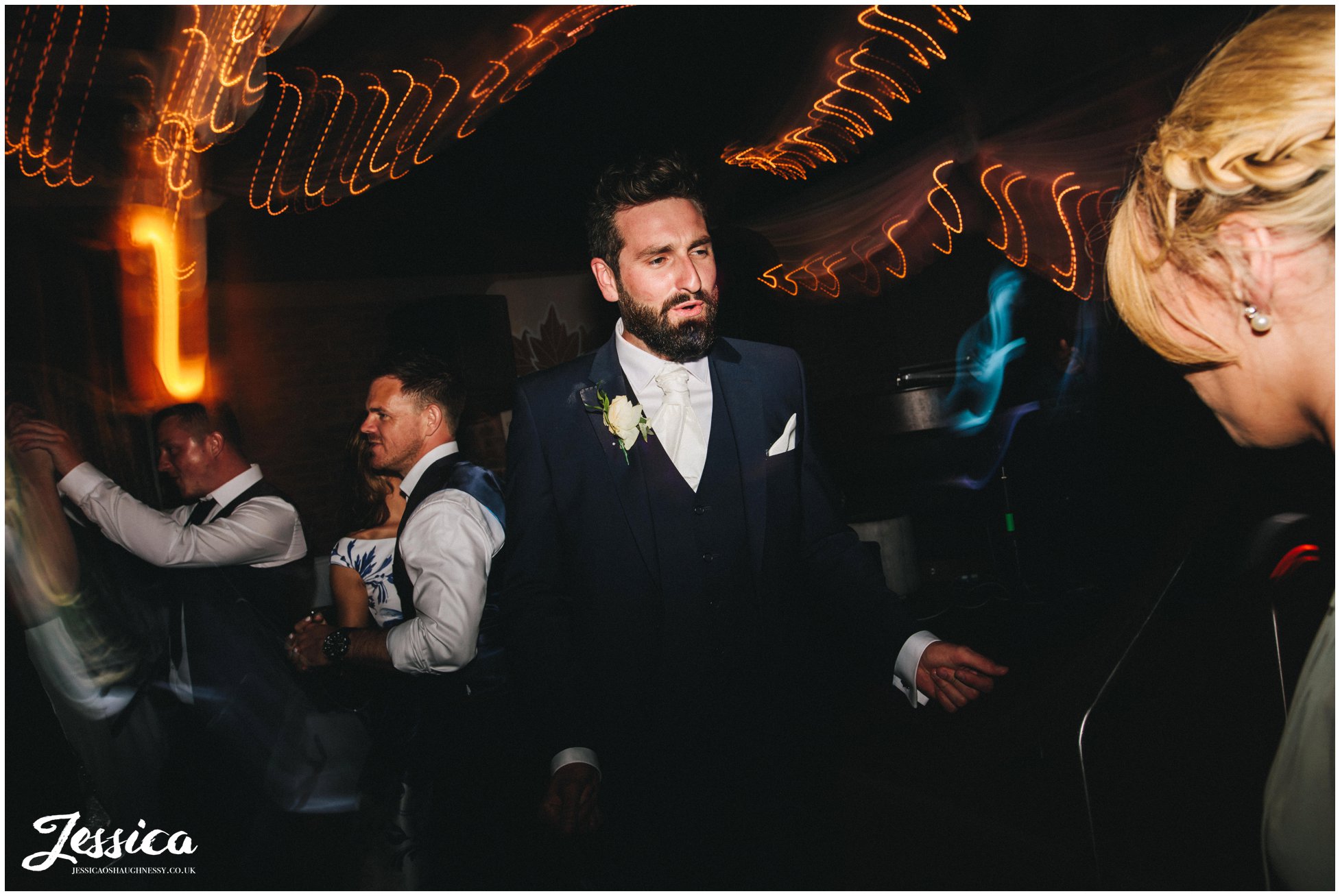 groomsmen dances at the north west wedding venue