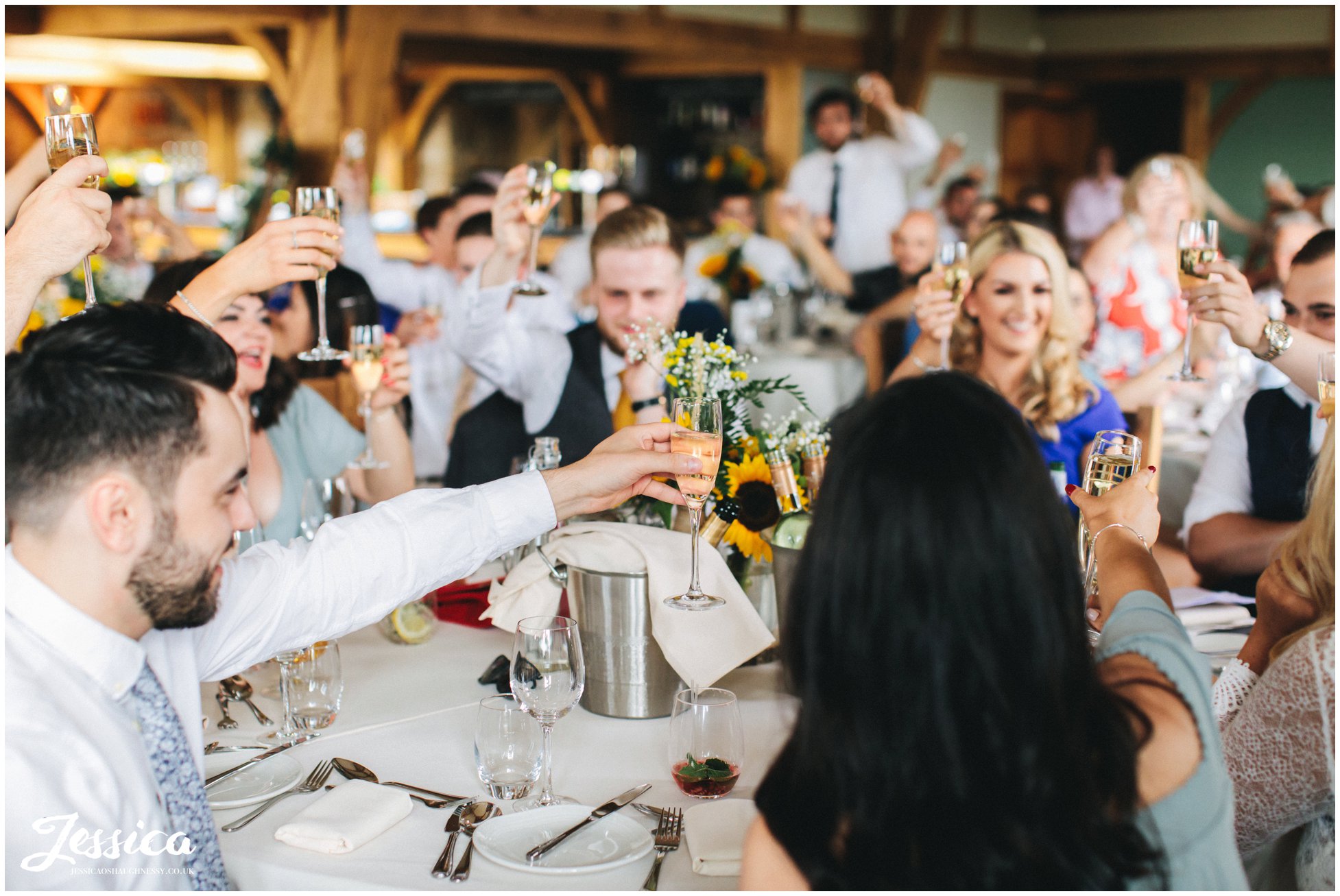 Guests toast with champagne