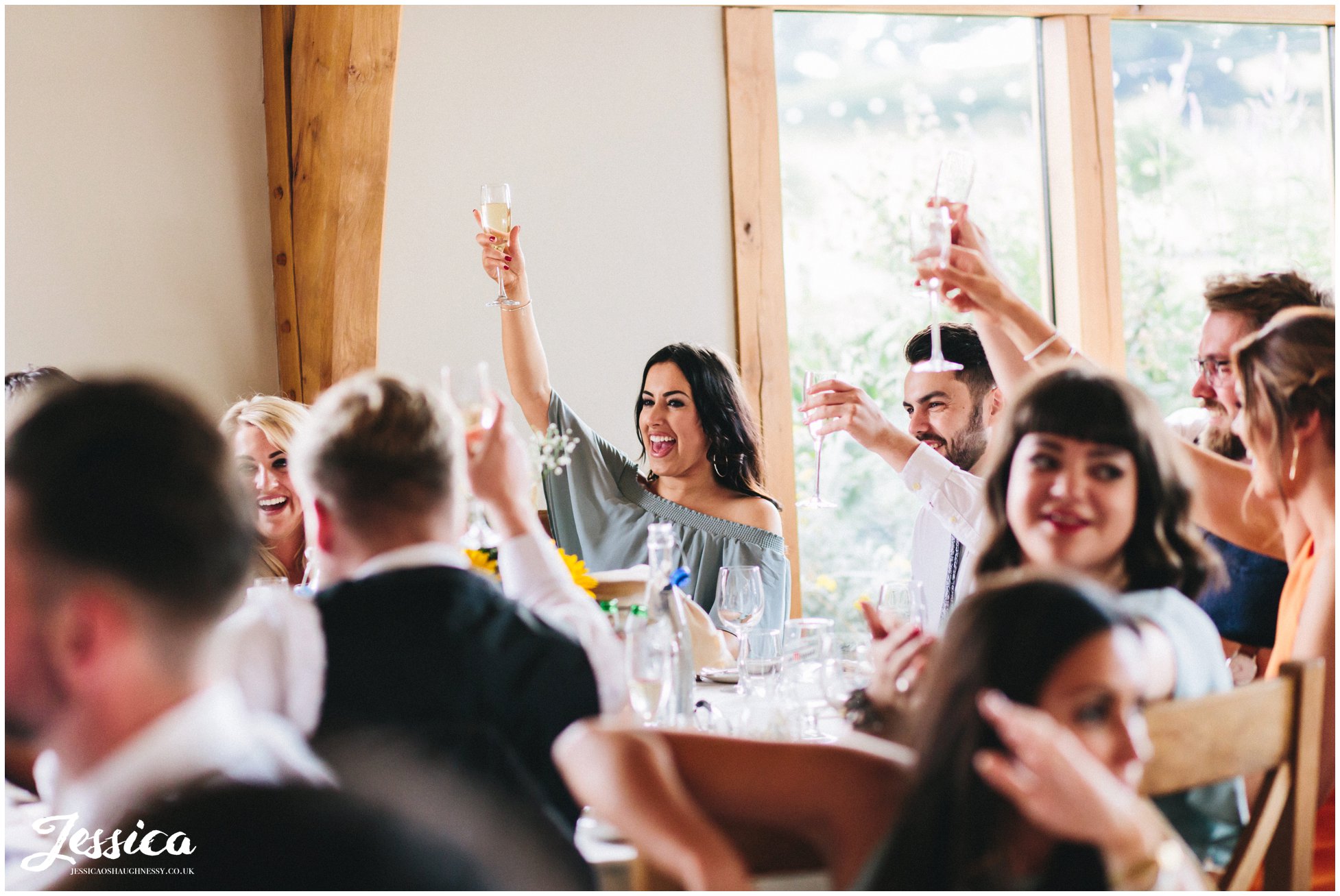 maid of honour toasts the new couple