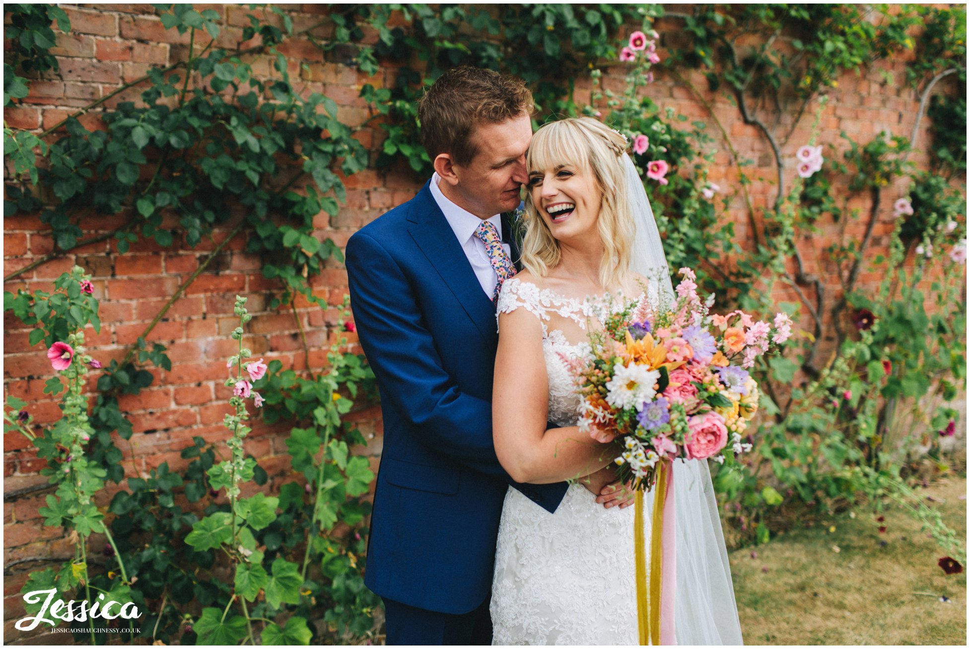 the groom kisses the brides cheek