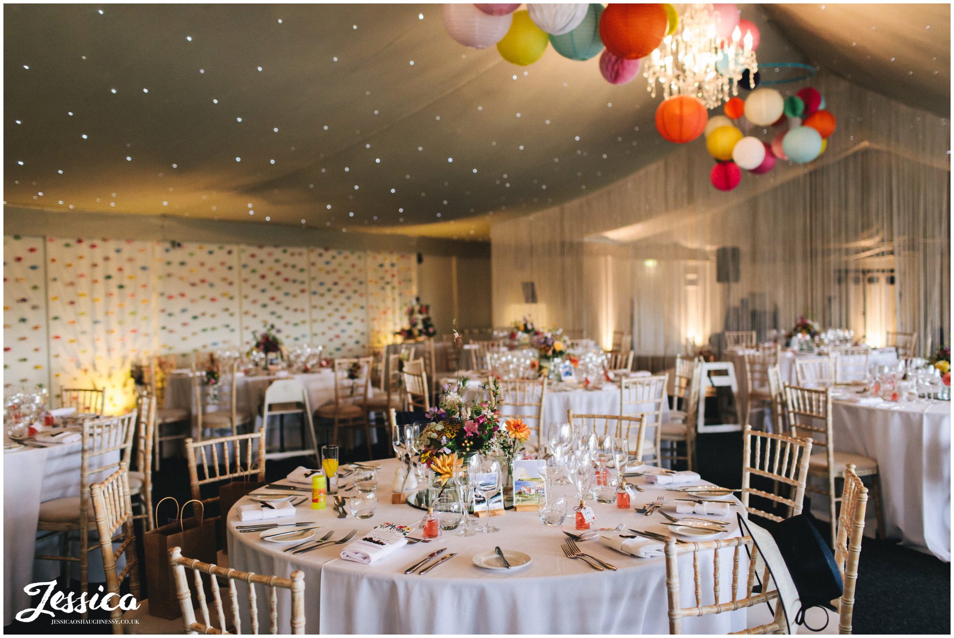 the pavilion at combermere abbey decorated in colourful lanterns