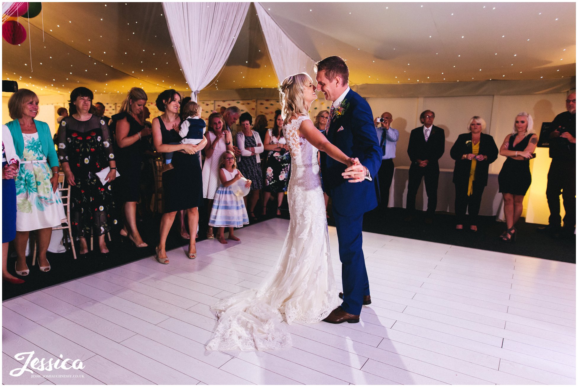 the couple share their first dance at combermere abbey