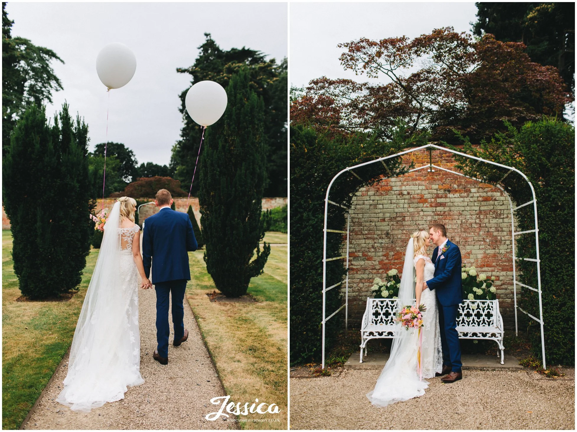 couple walk holding giant white balloons