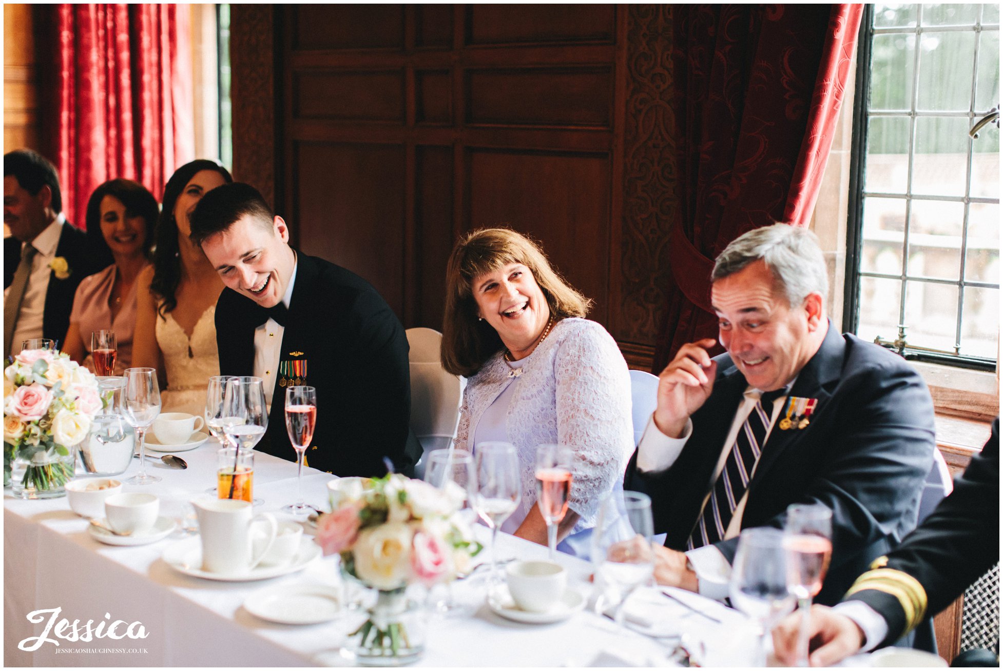 mother of the groom enjoys the speeches in inglewood manor