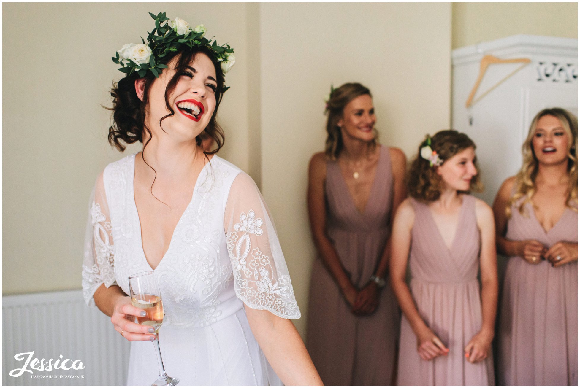 bride laughs on the morning of her chester wedding