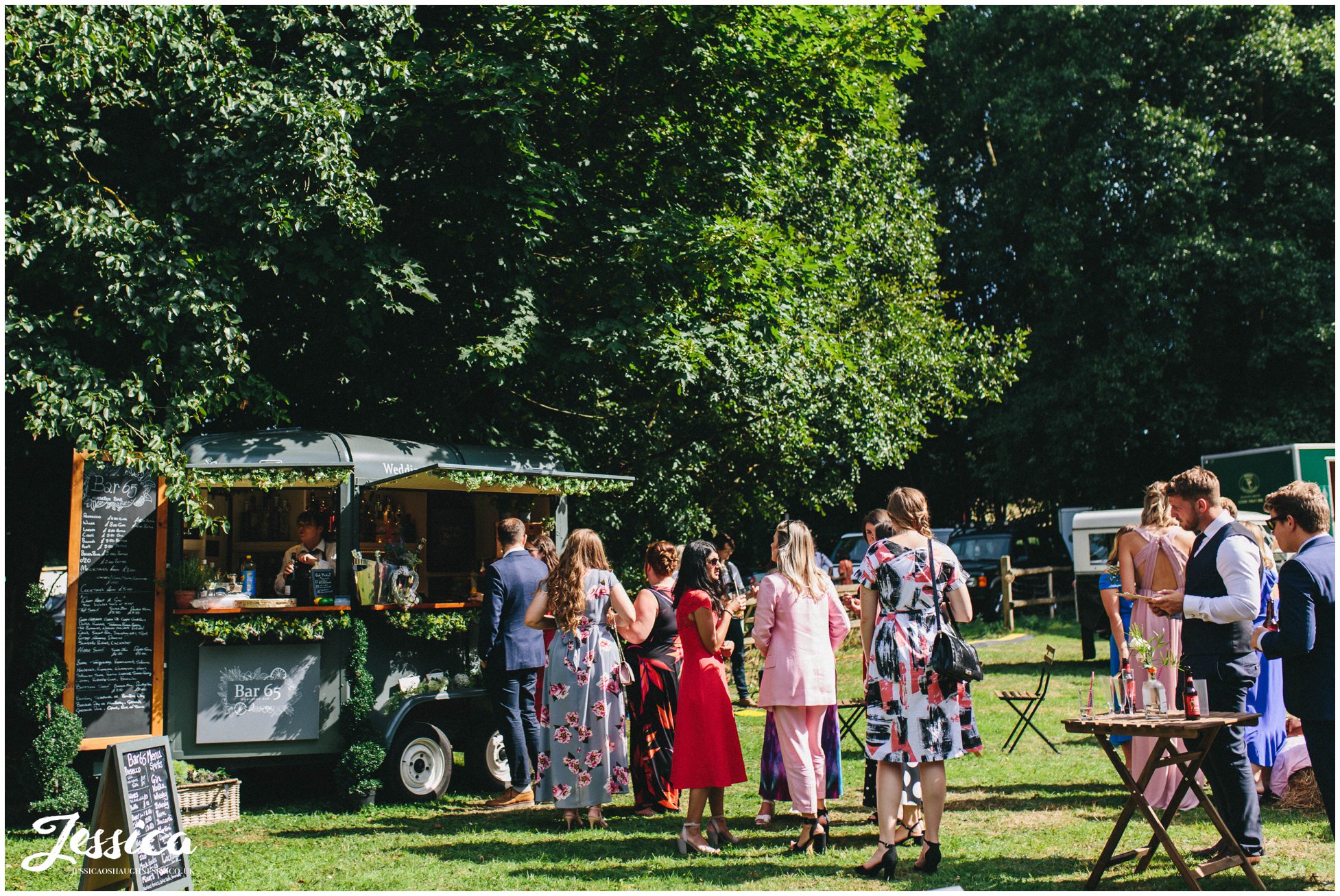 guests buy drinks from quirky pop up bar