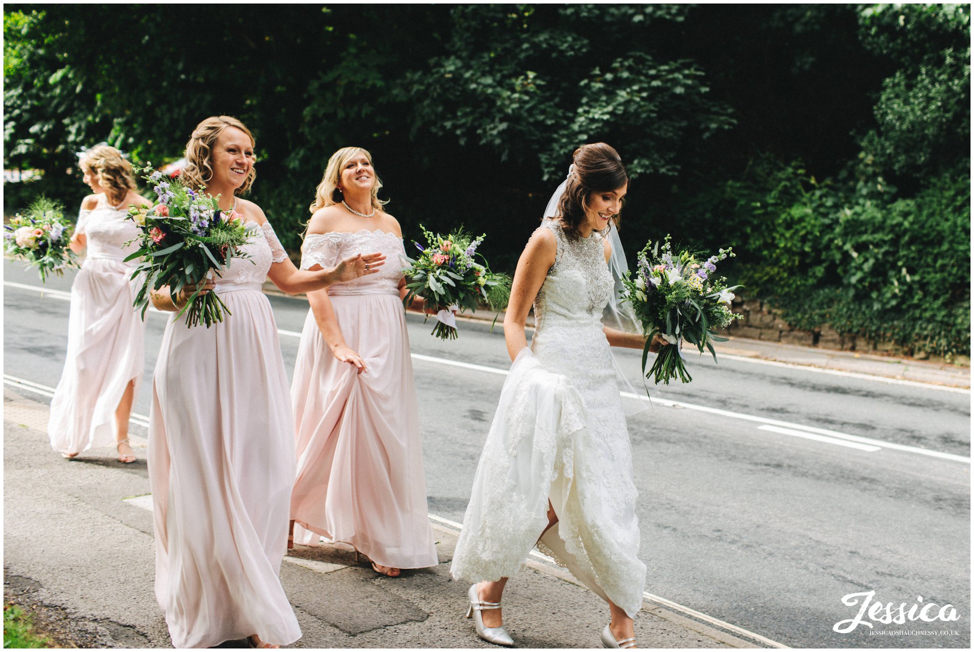 Bride walks to Buxton Pavilion Garden's for her wedding