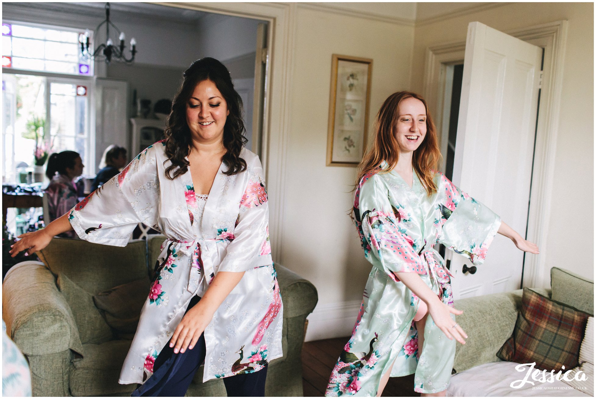 bride and bridesmaid dance around