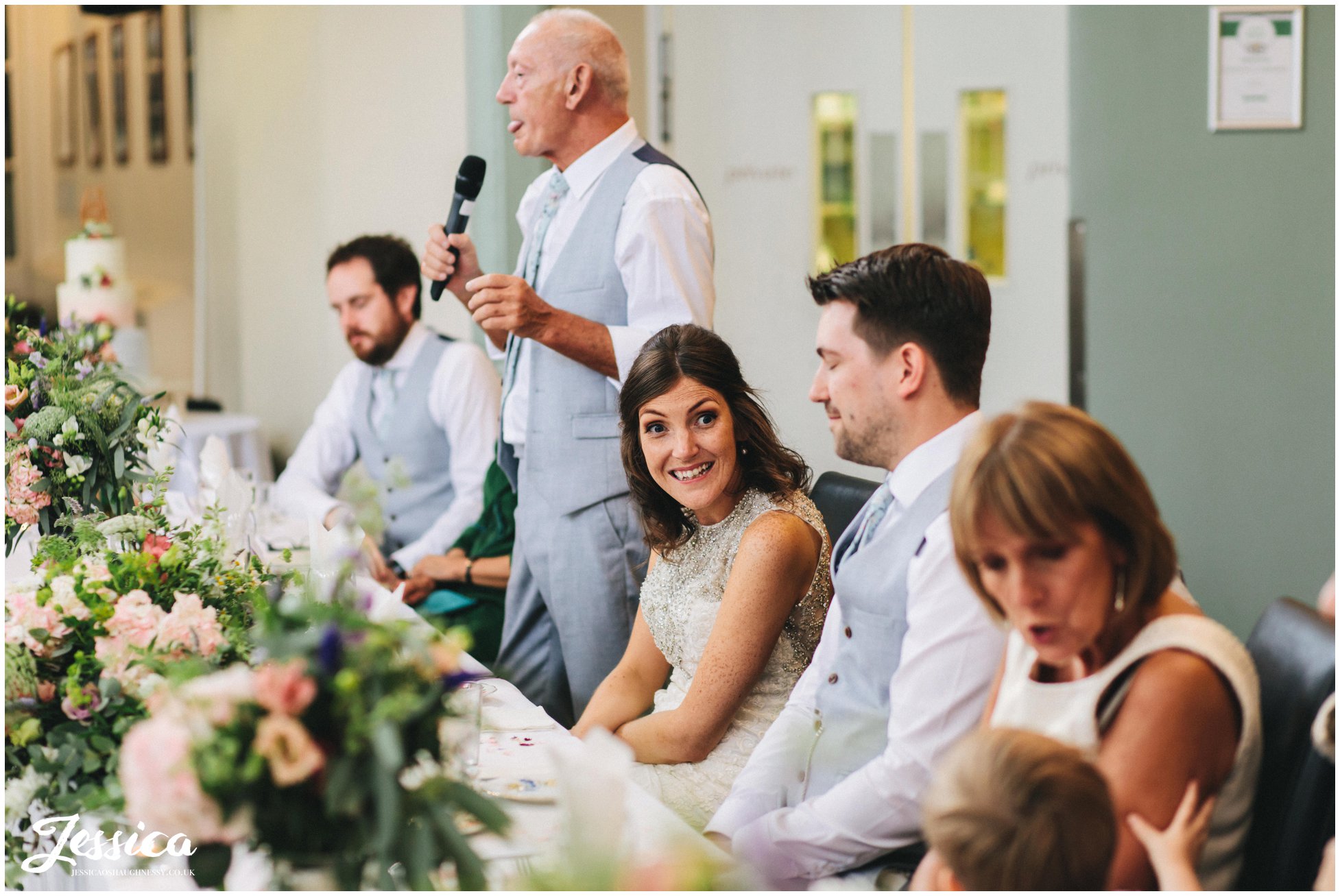 bride laughs during the father of the brides speech