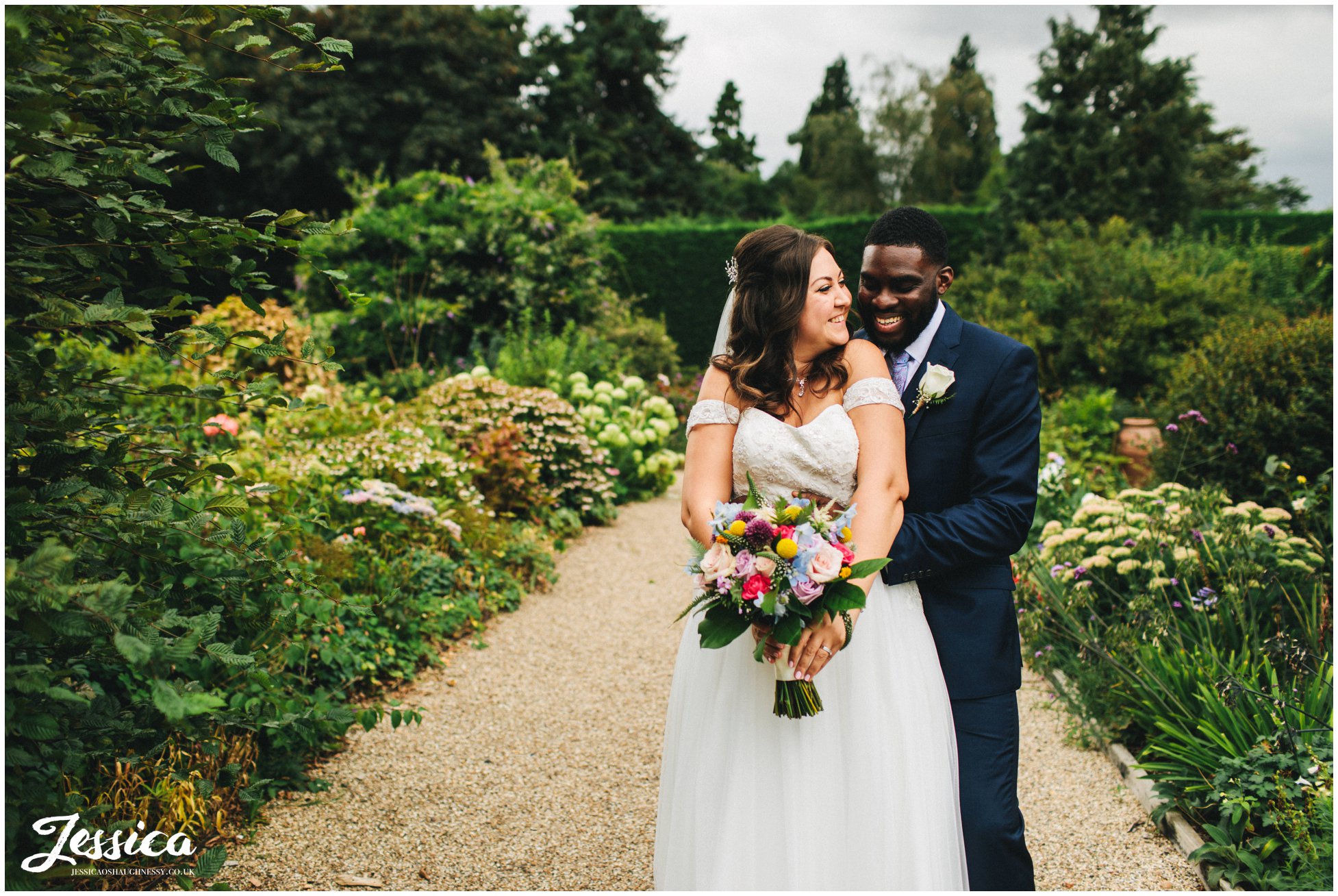 the couple laugh whilst hugging in the epping wedding venue