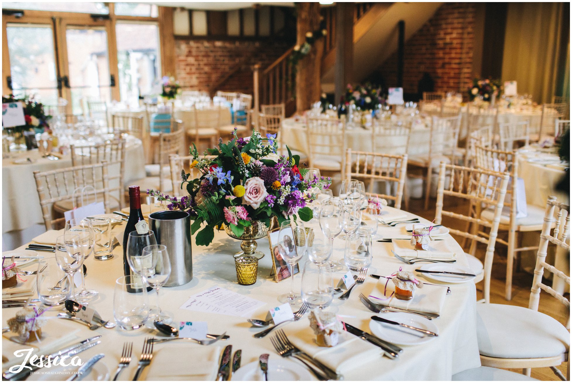 the barn is decorated with brightly coloured flowers