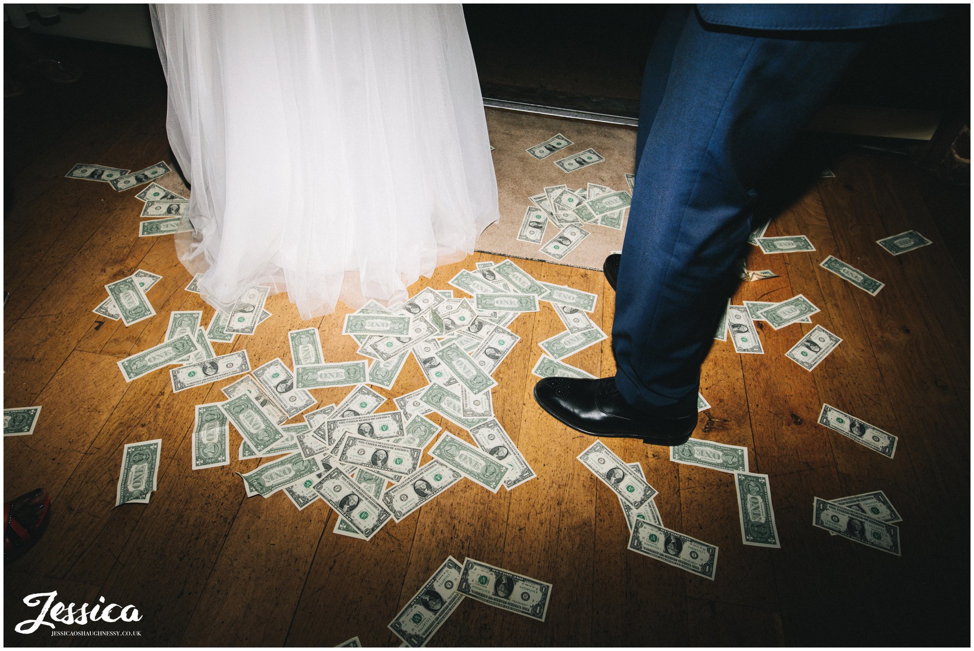 dollars cover the floor in a nigerian wedding tradition