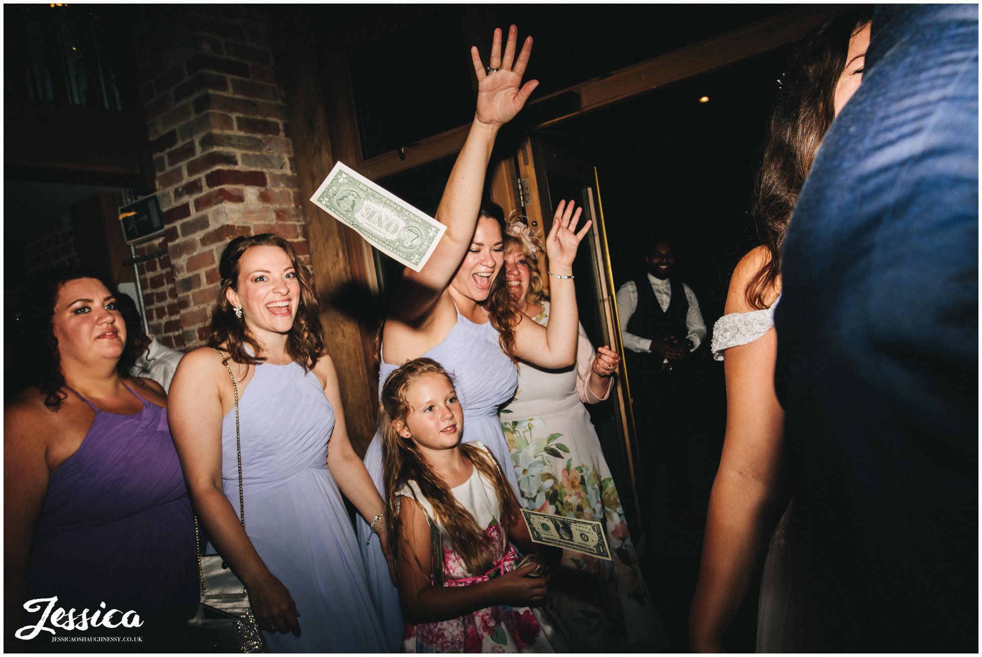 the bridesmaids throw dollars at gaynes park