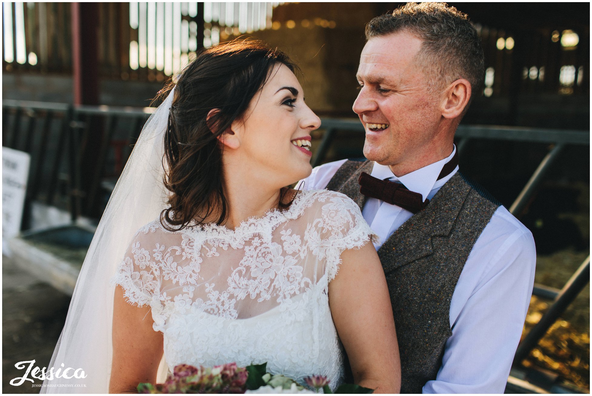 couple laugh together on their nantwich wedding day