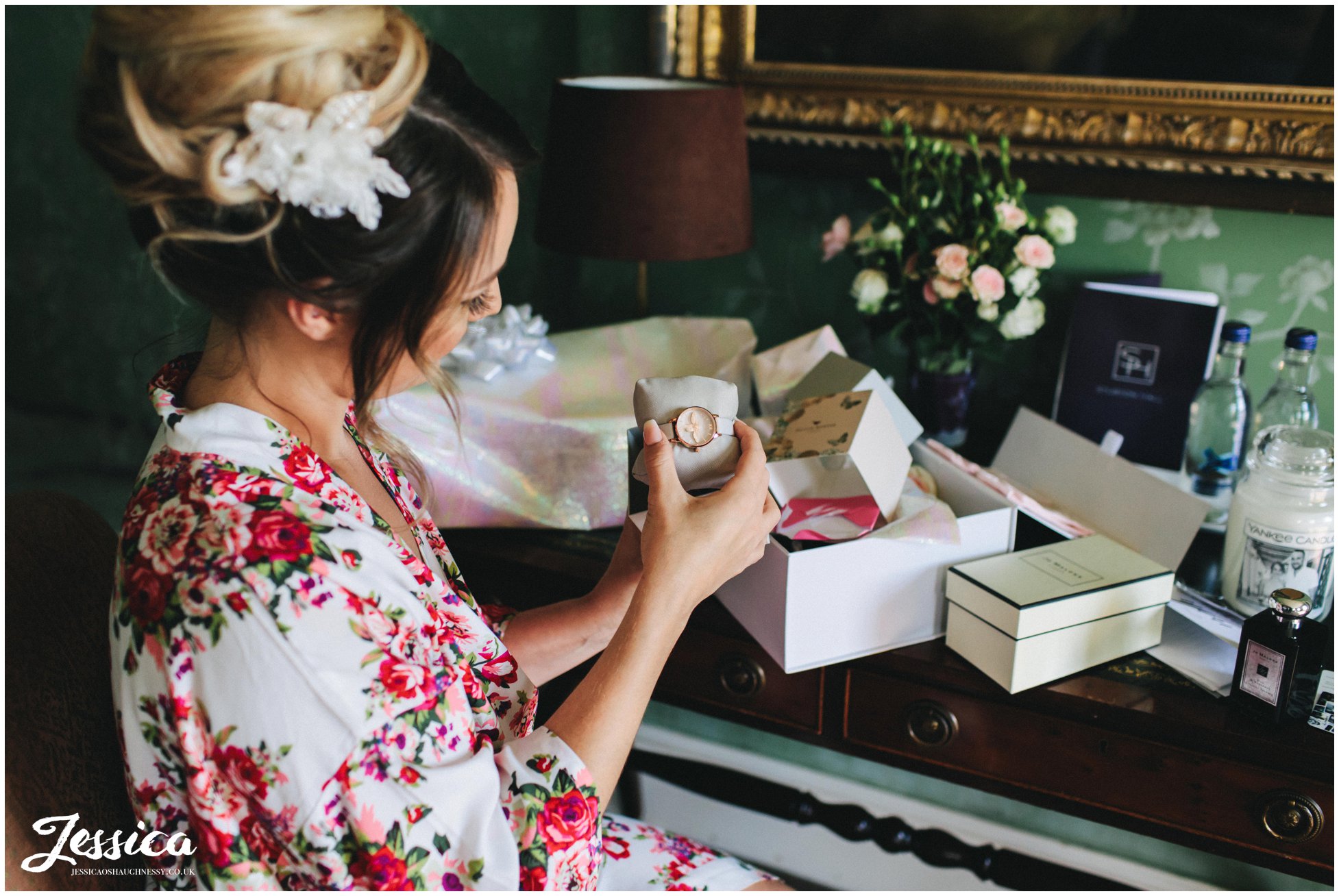 the bride opens presents from her groom