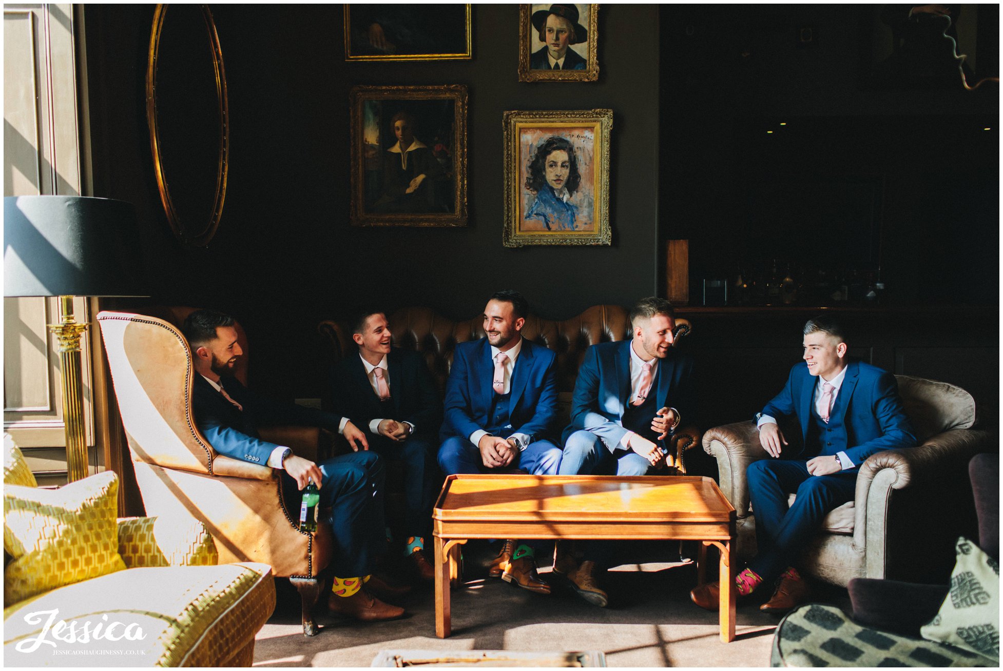 the groomsmen gather in the chocolate room at stubton hall