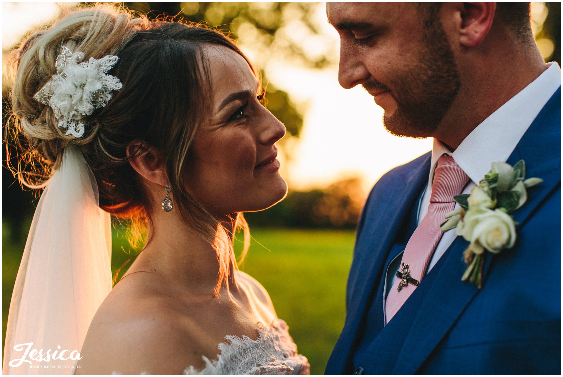 the bride smiles at her groom at stubton hall