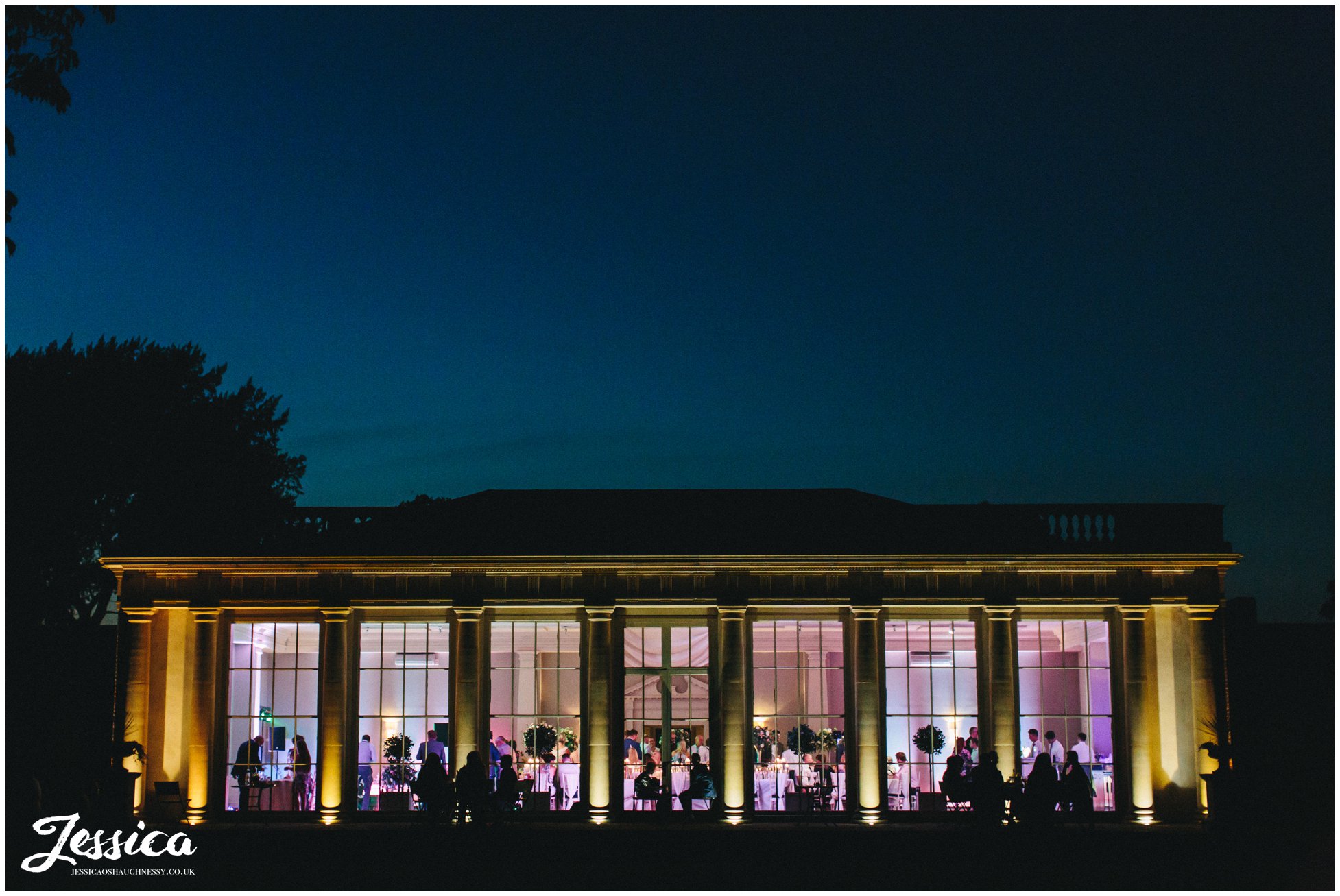 stubton hall lit up at night for the evening reception