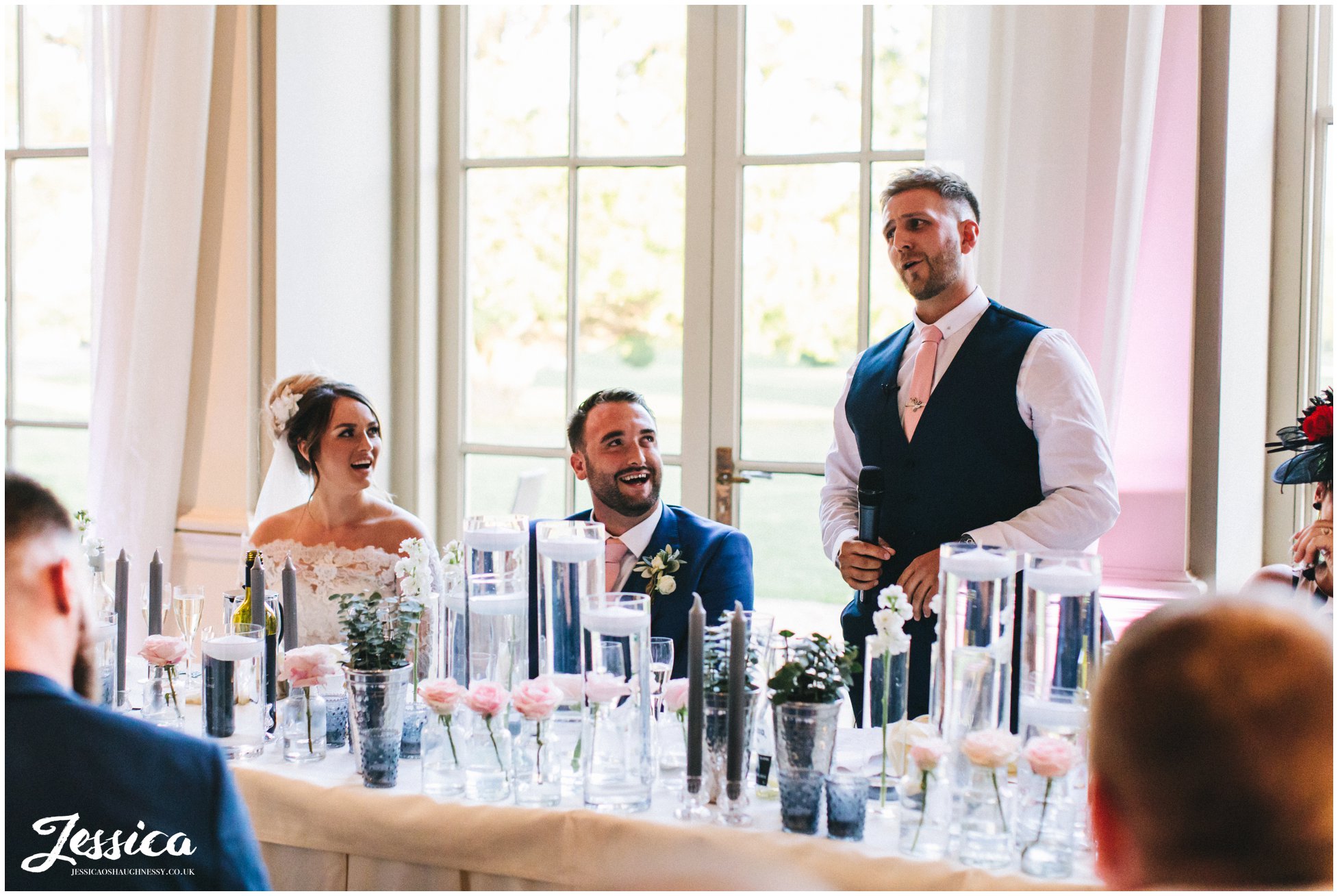 the best man stands to give his speech