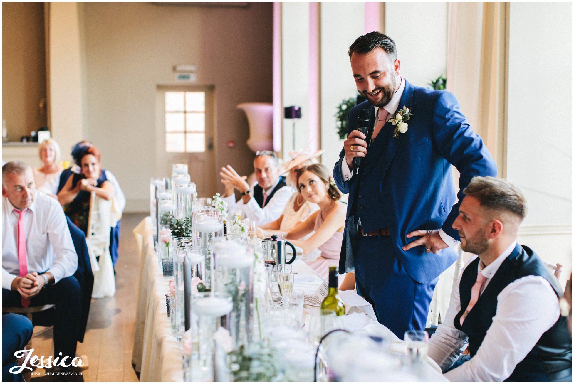 the groom delivers his speech at his newark wedding