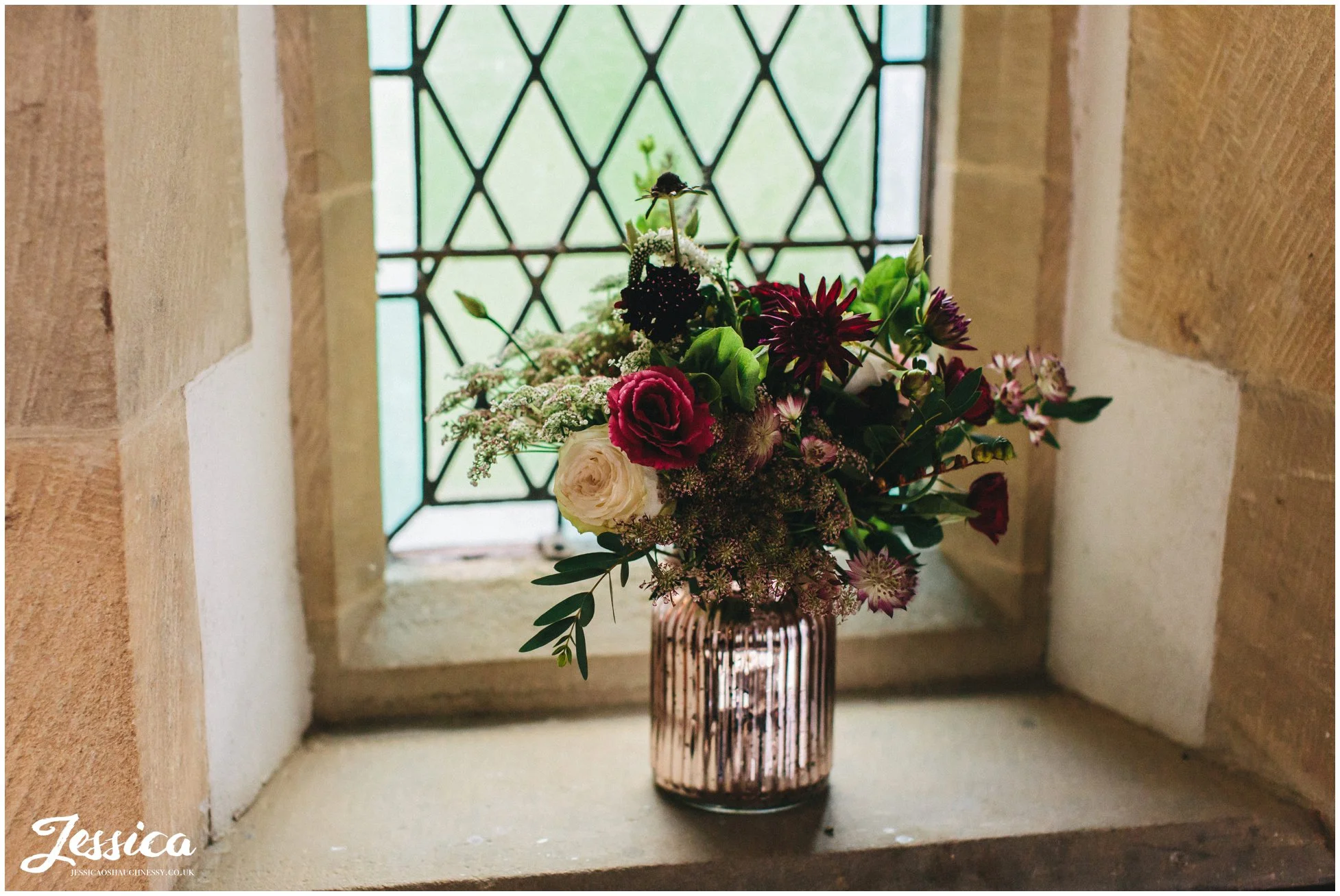 floral displays decorate the windows