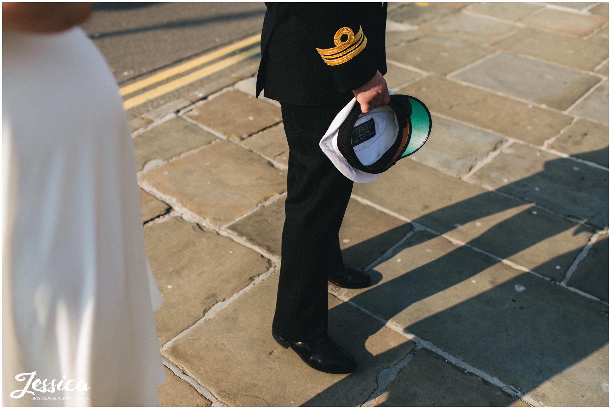 groom waits outside st georges hall before the ceremony