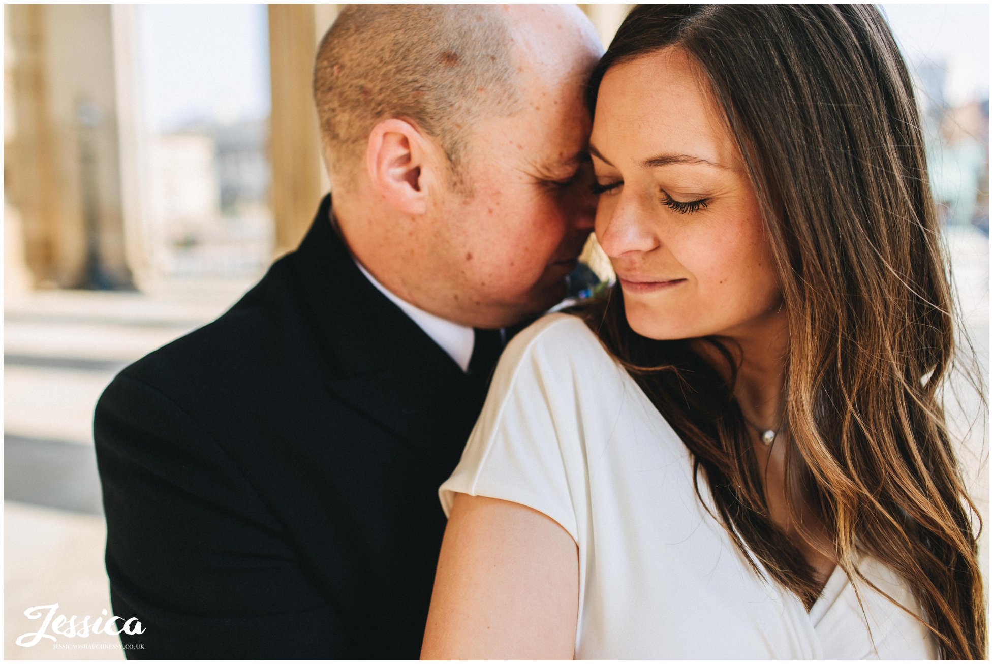 the couple hold each other after their liverpool elopement