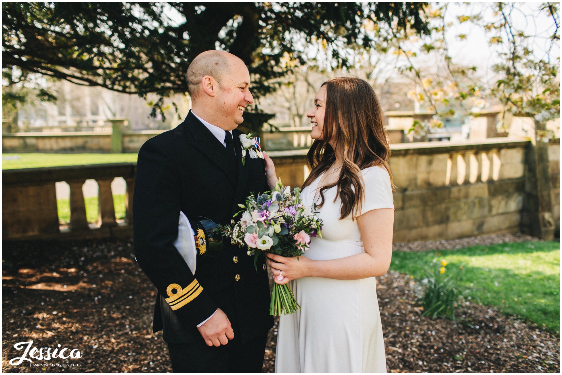 the new couple wander through the gardens at  st georges hall