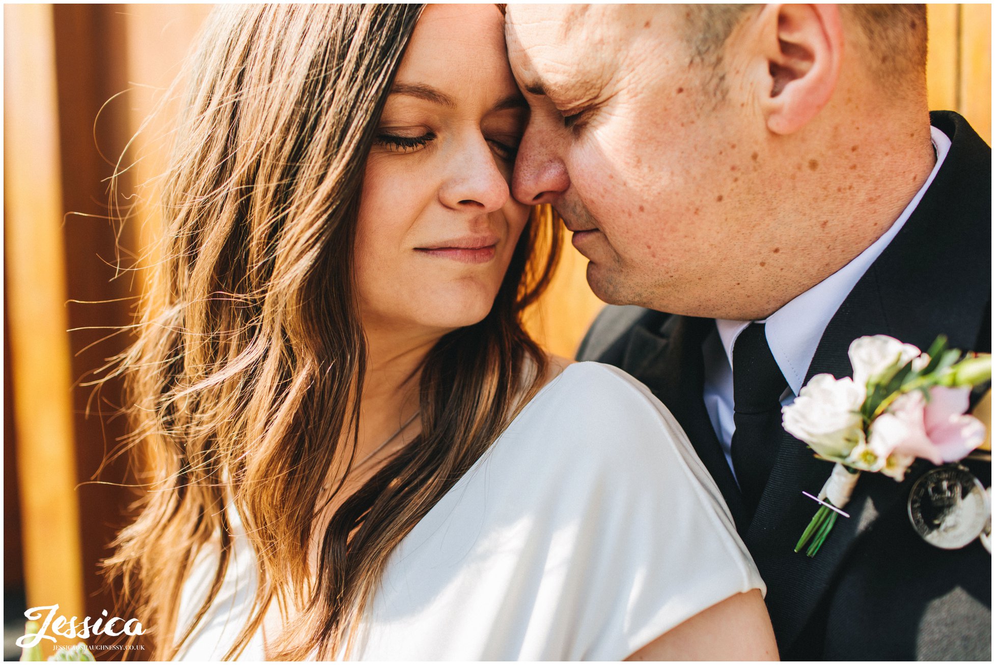 couple stand outside hope street hotel after they elope in liverpool