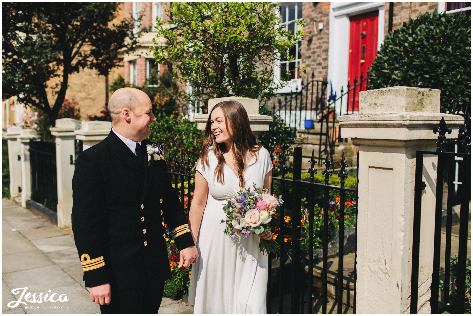 the couple wander down hope street in liverpool