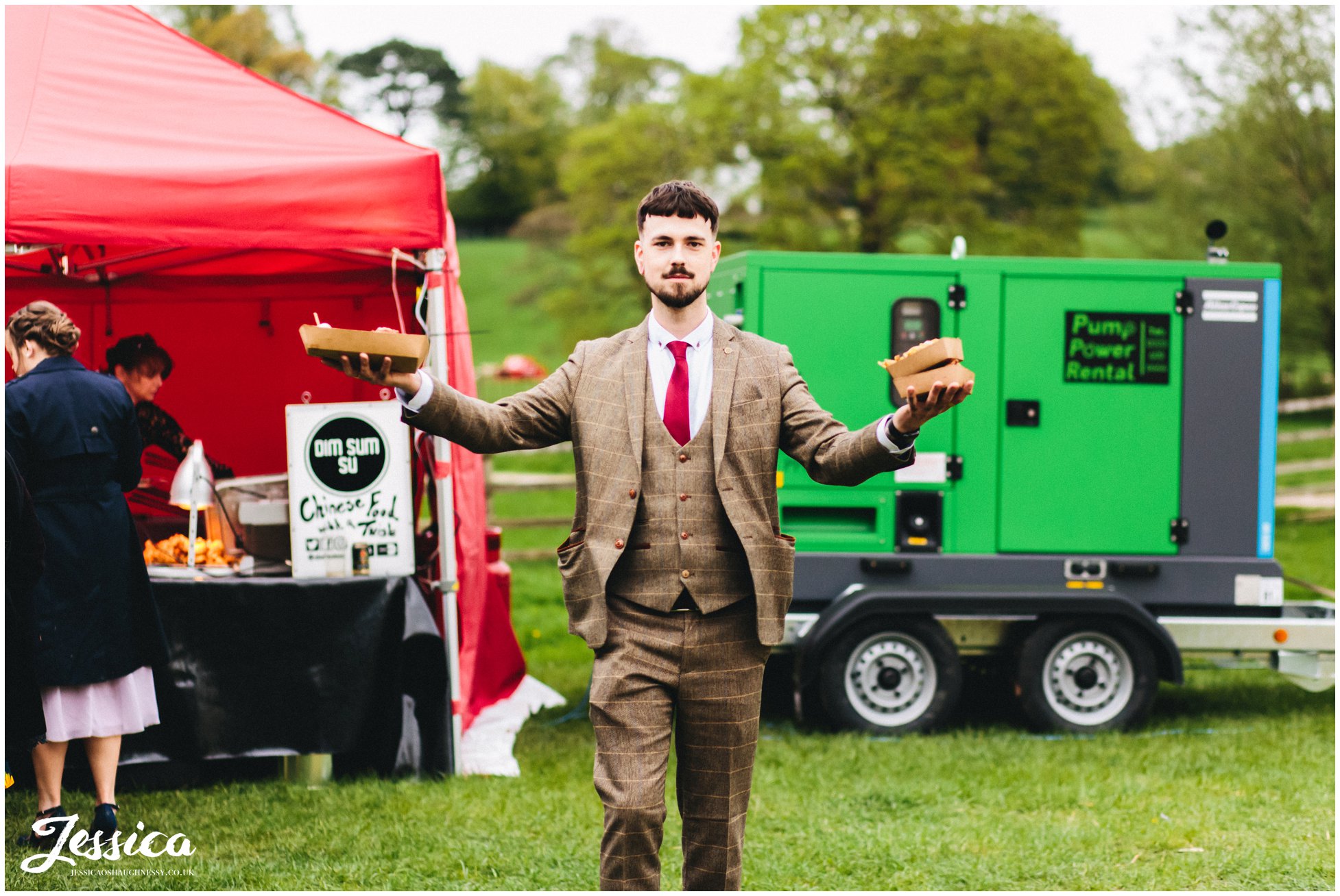 wedding guest shows off his wedding food
