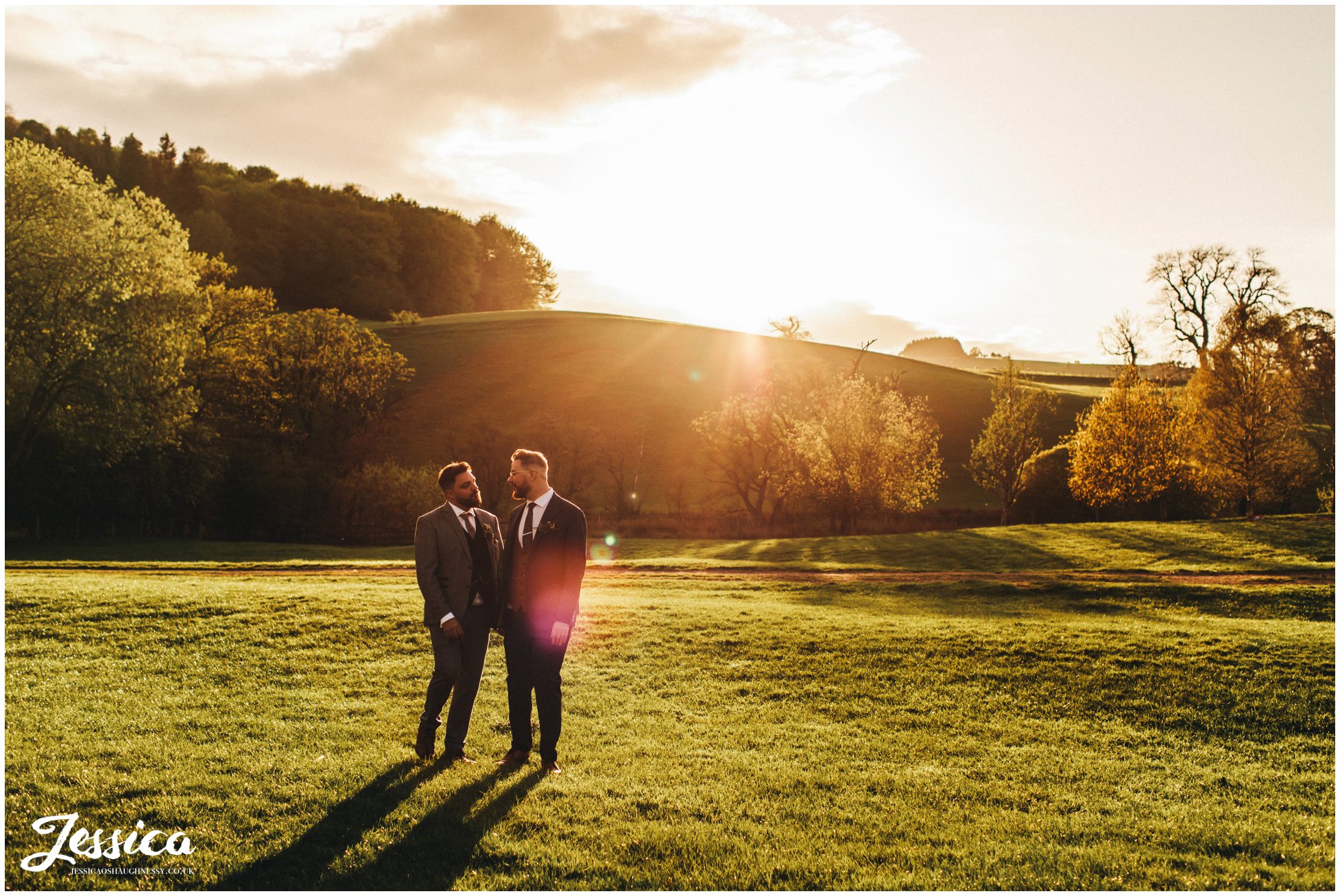 grooms take an walk in the evening sunlight