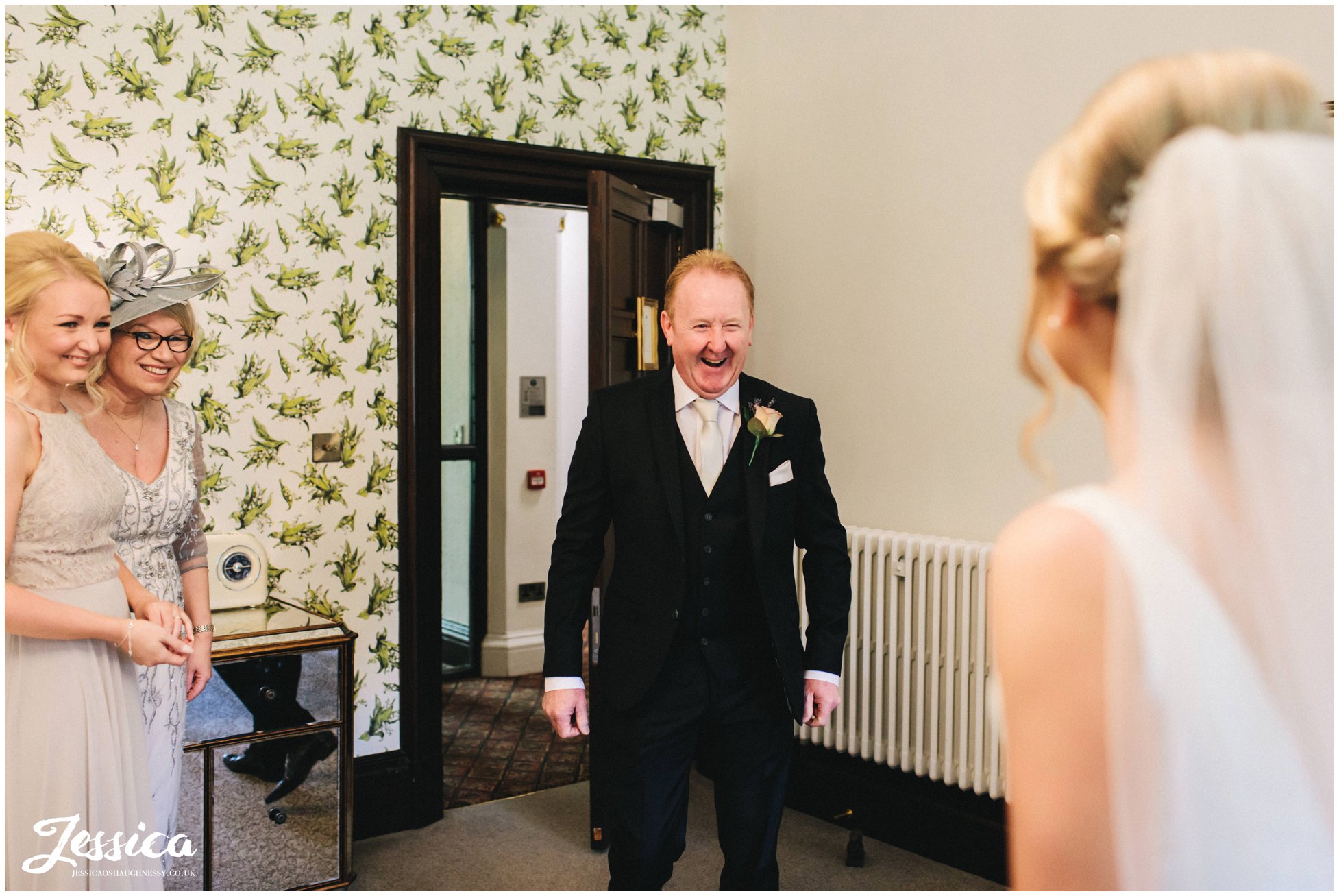 father of the bride see's his daughter for the first time in her dress