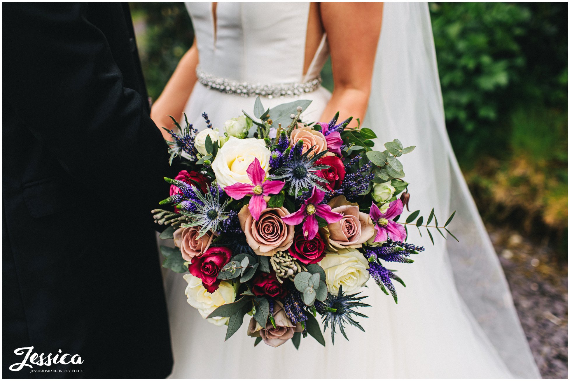 brides holds her bouquet