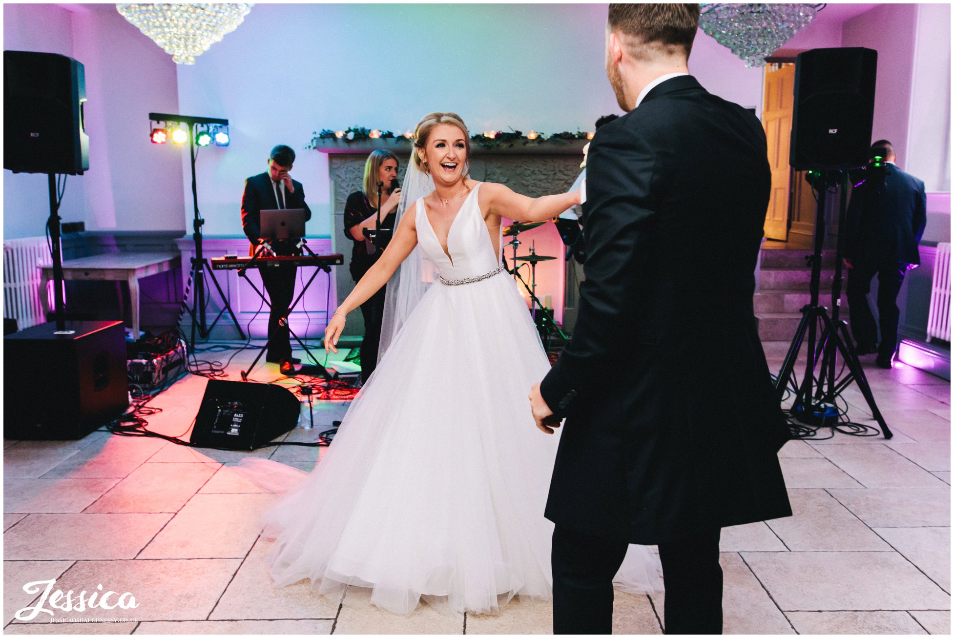 the bride &amp; groom share their first dance