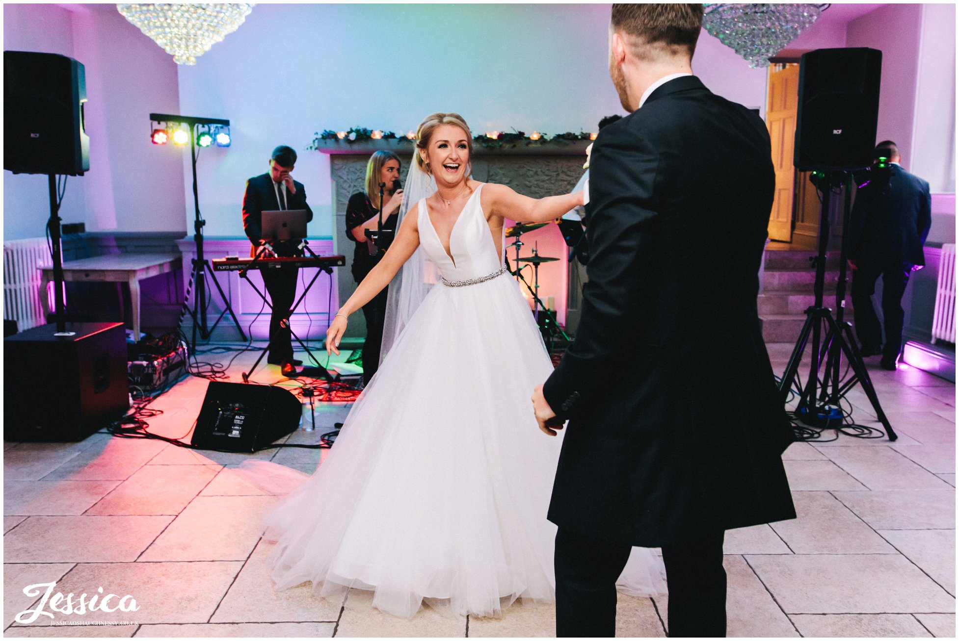 the bride & groom share their first dance