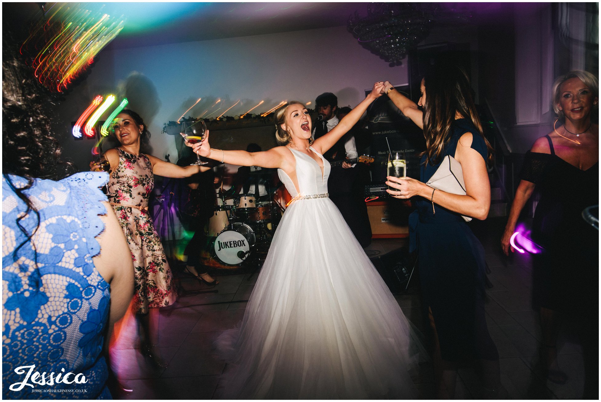 bride dances with her friends at tyn dwr hall in north wales