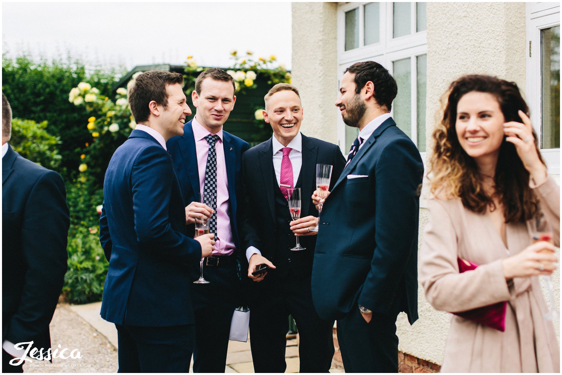 guests enjoy the nice weather outside the wedding venue