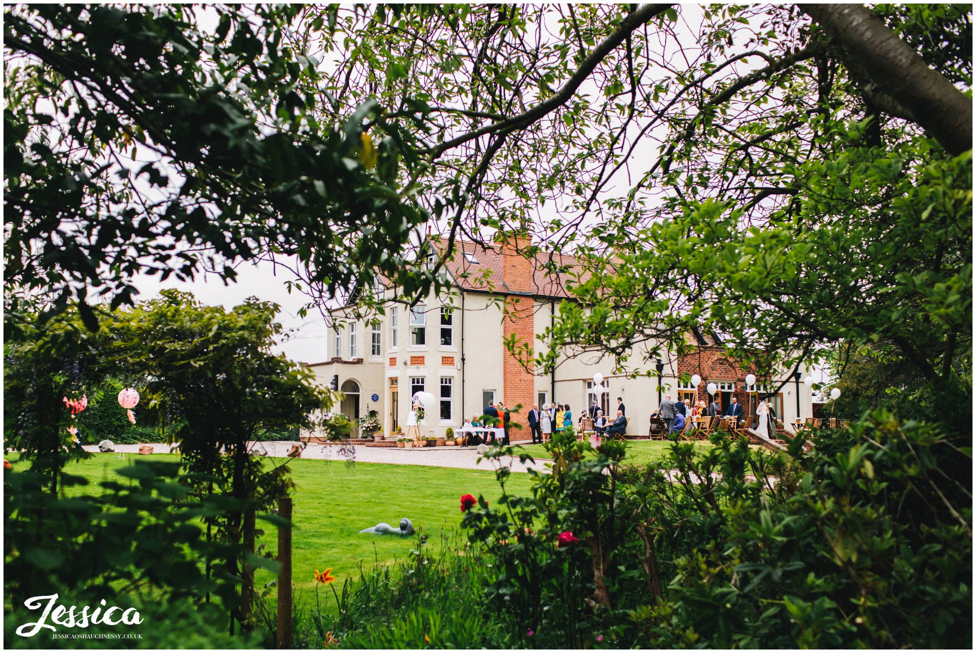 guests arrive for wedding reception at mere brook house, wirral