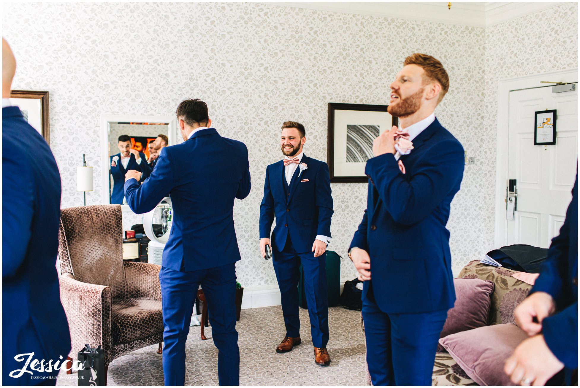 the groom &amp; groomsmen are dressed ready for the wedding at mottram hall
