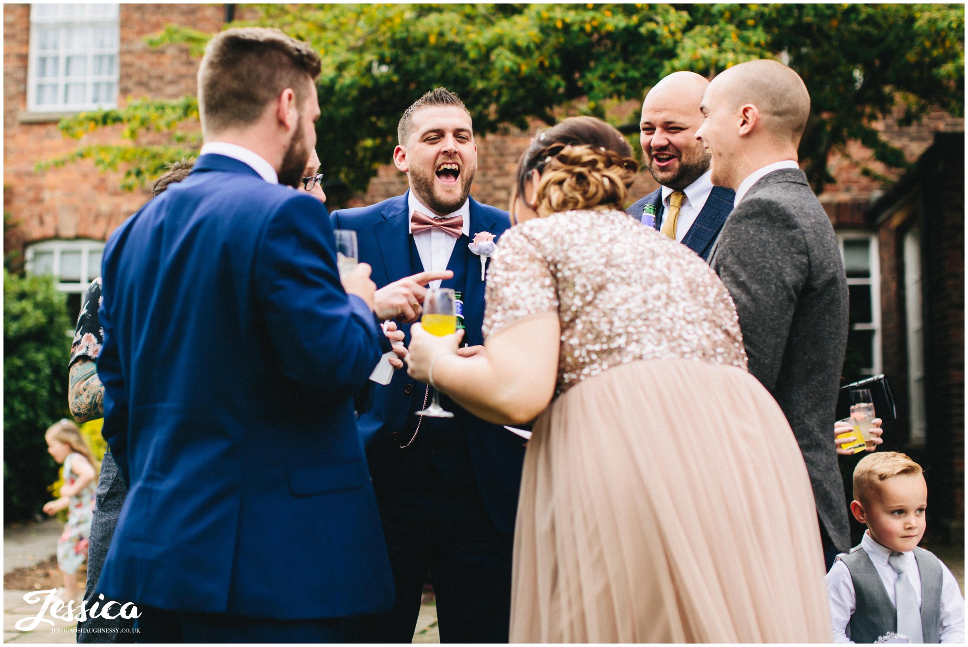 best man laughs outside mottram hall