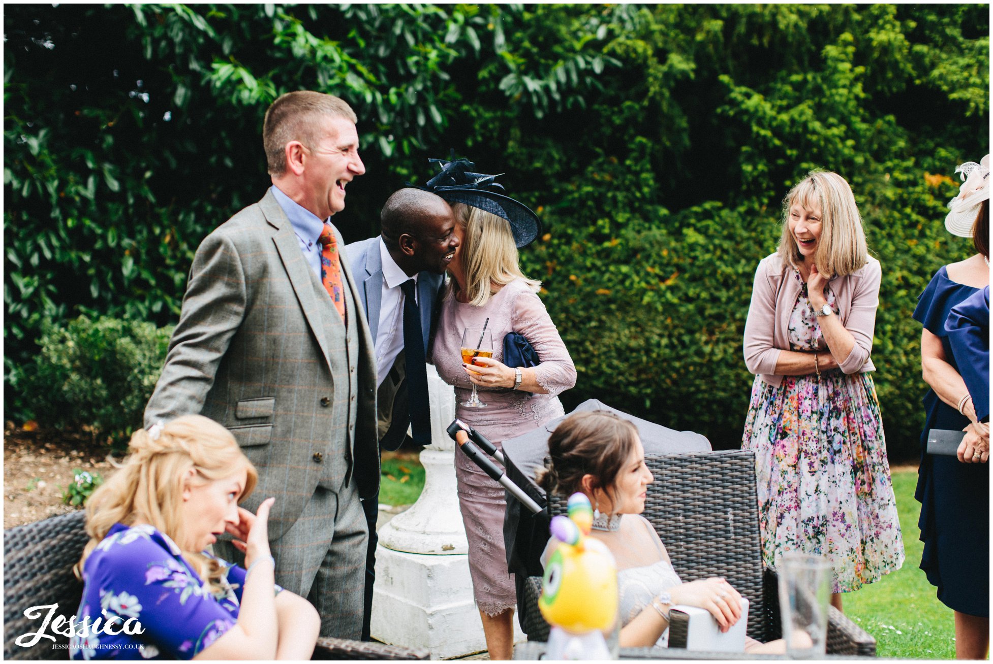 guests enjoy the nice weather at mottram hall wedding in cheshire