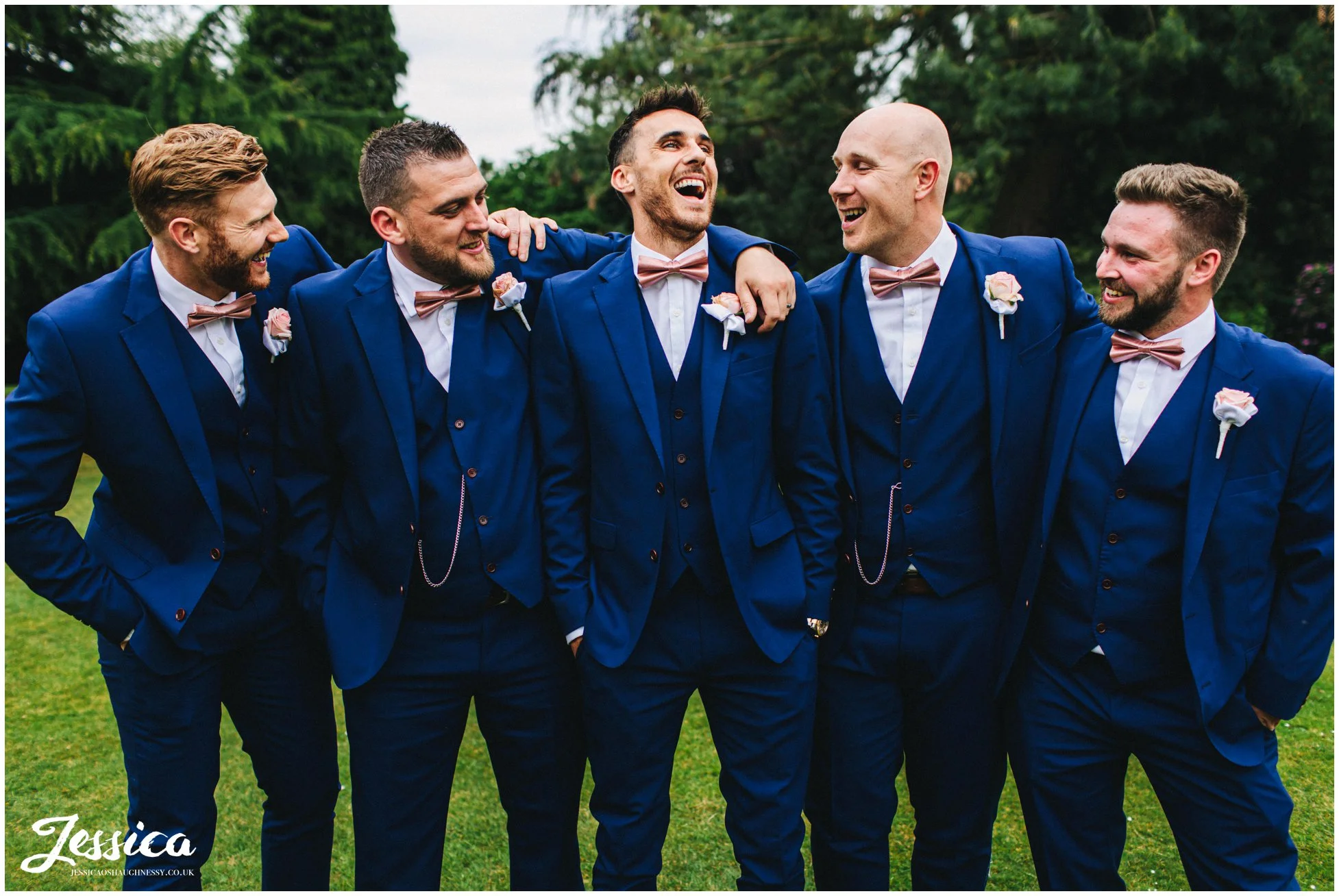 groom & groomsmen pose for group photograph