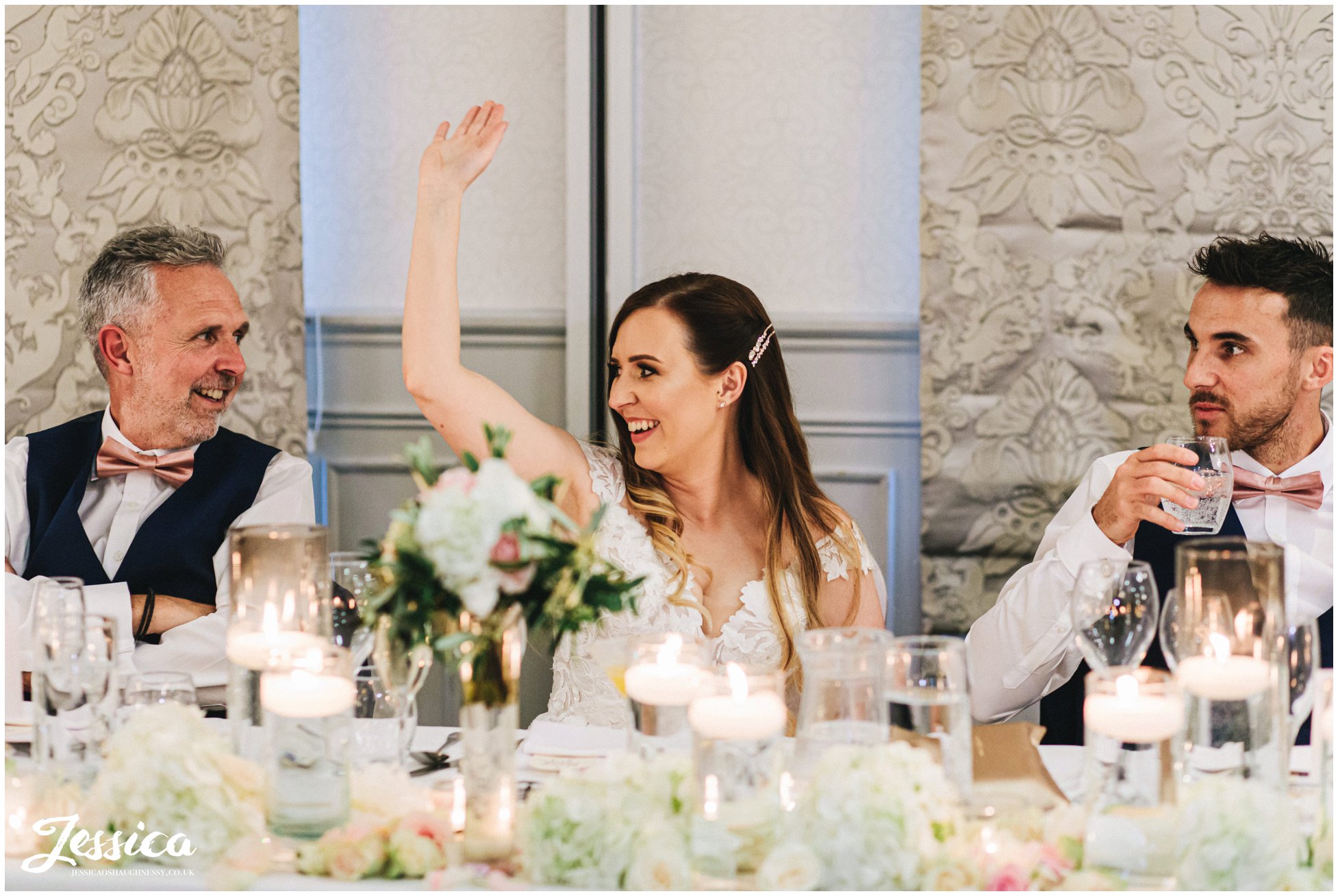 bride cheers during the speeches