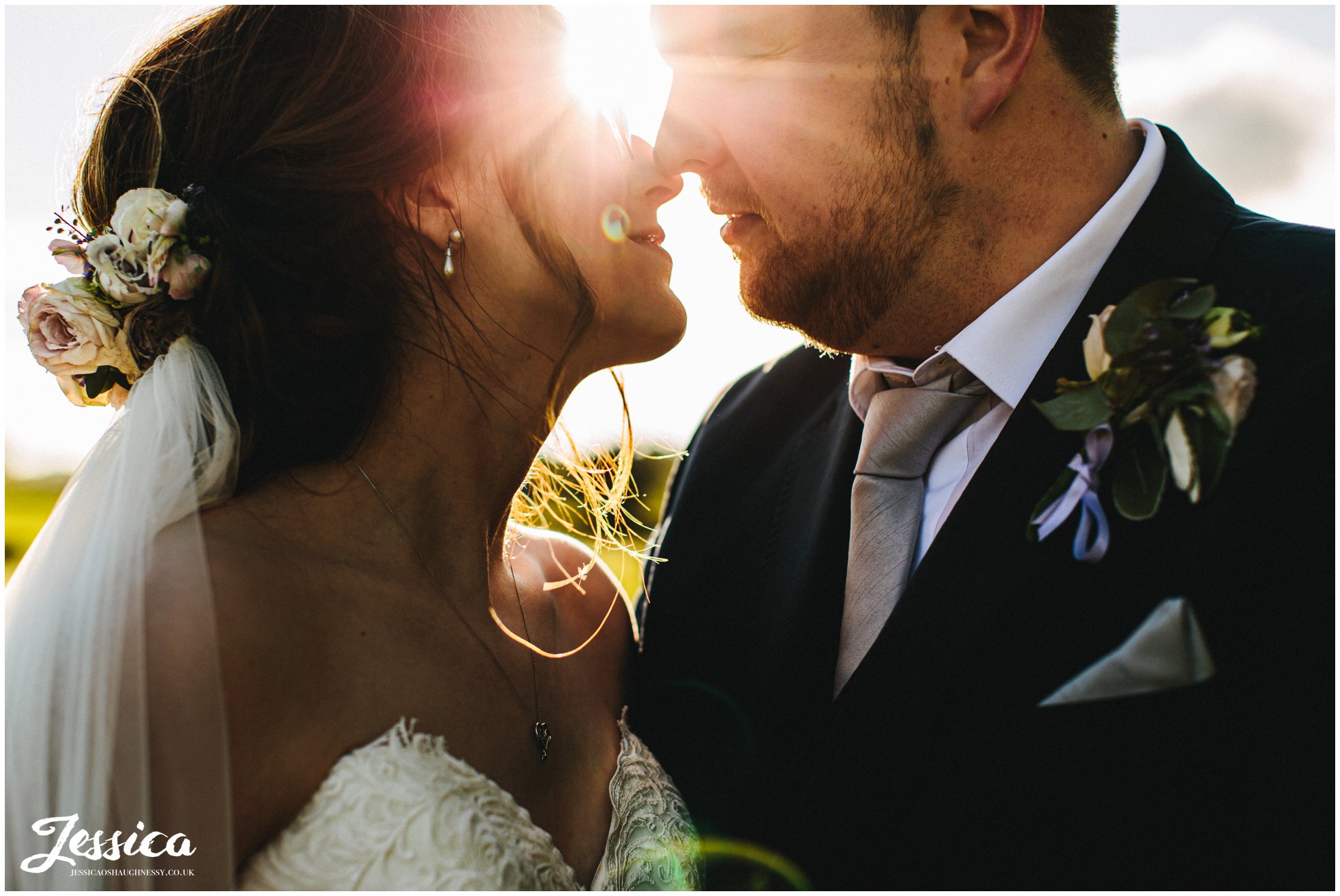 couple kiss in evening sun