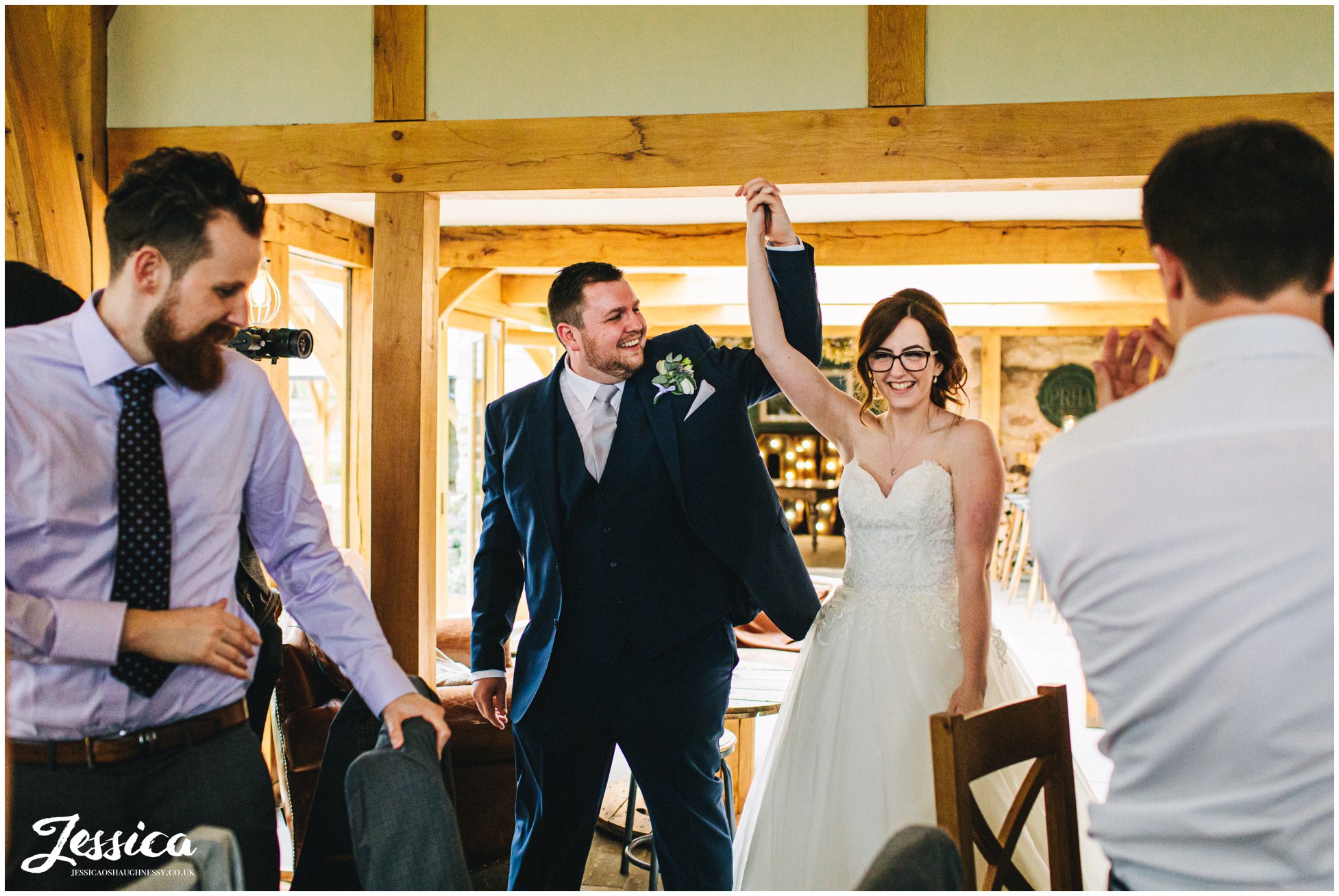 couple make their entrance after being announced in 