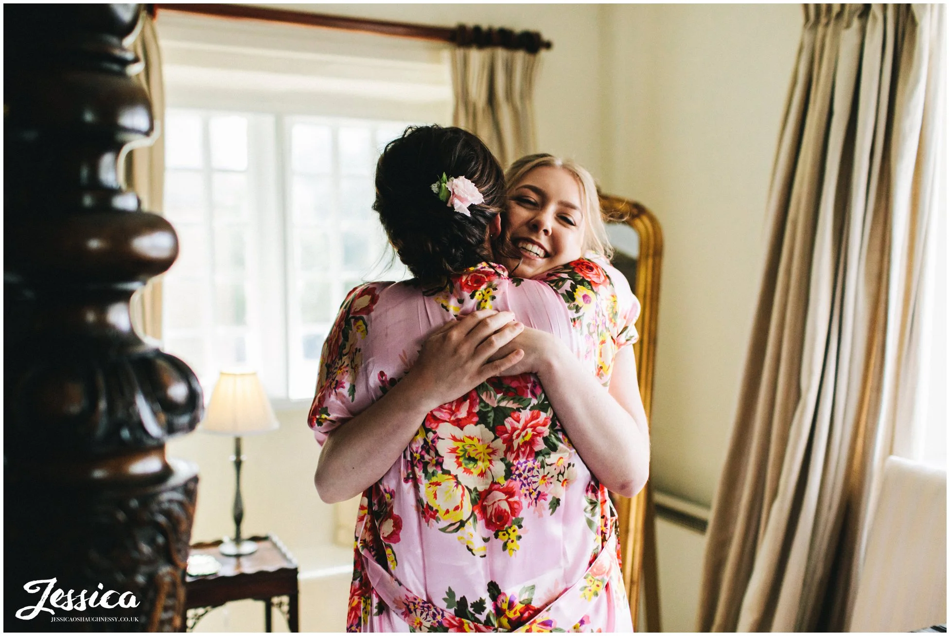 bridesmaids hug on the wedding morning
